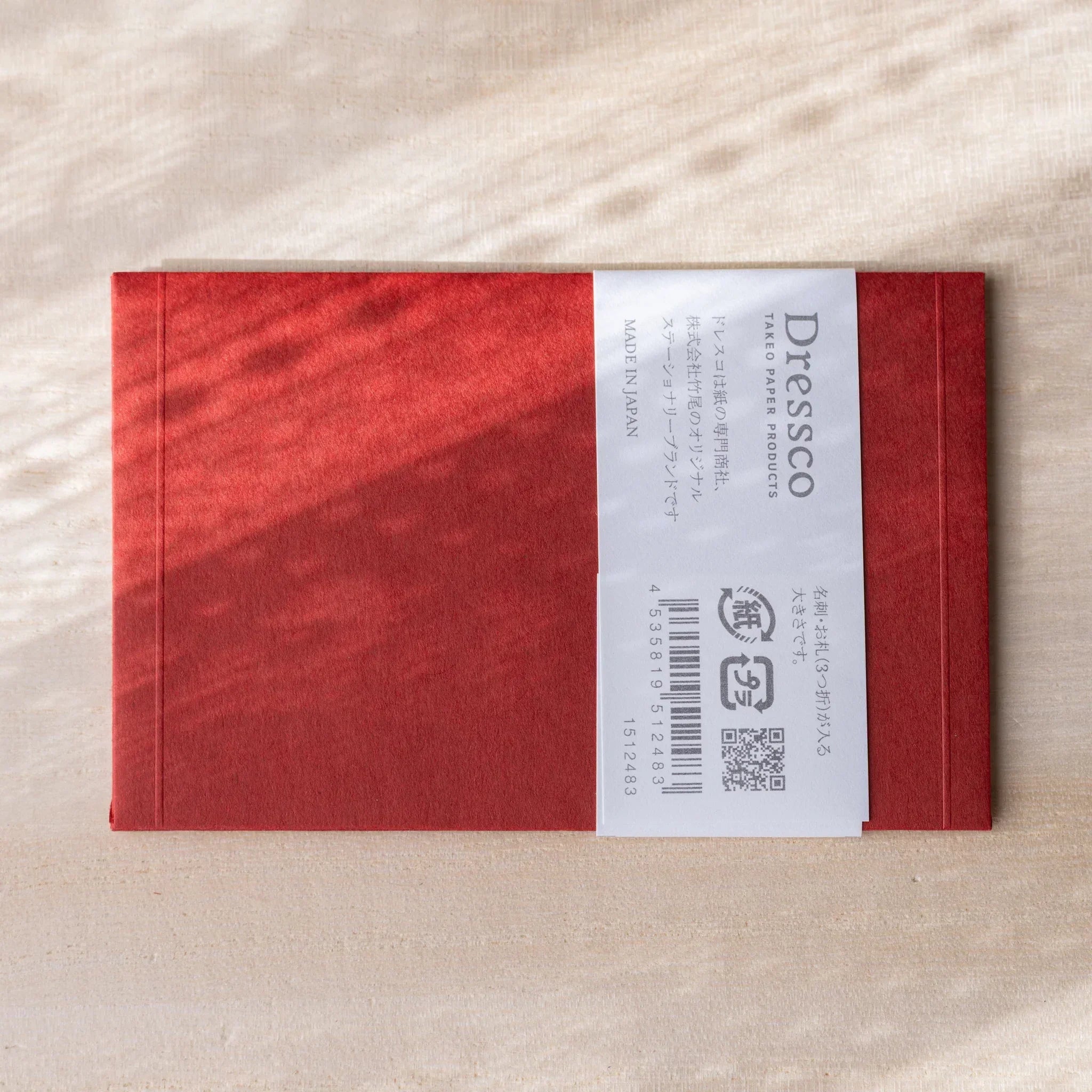 Dressco small embossed envelope, white, product display showing raised texture