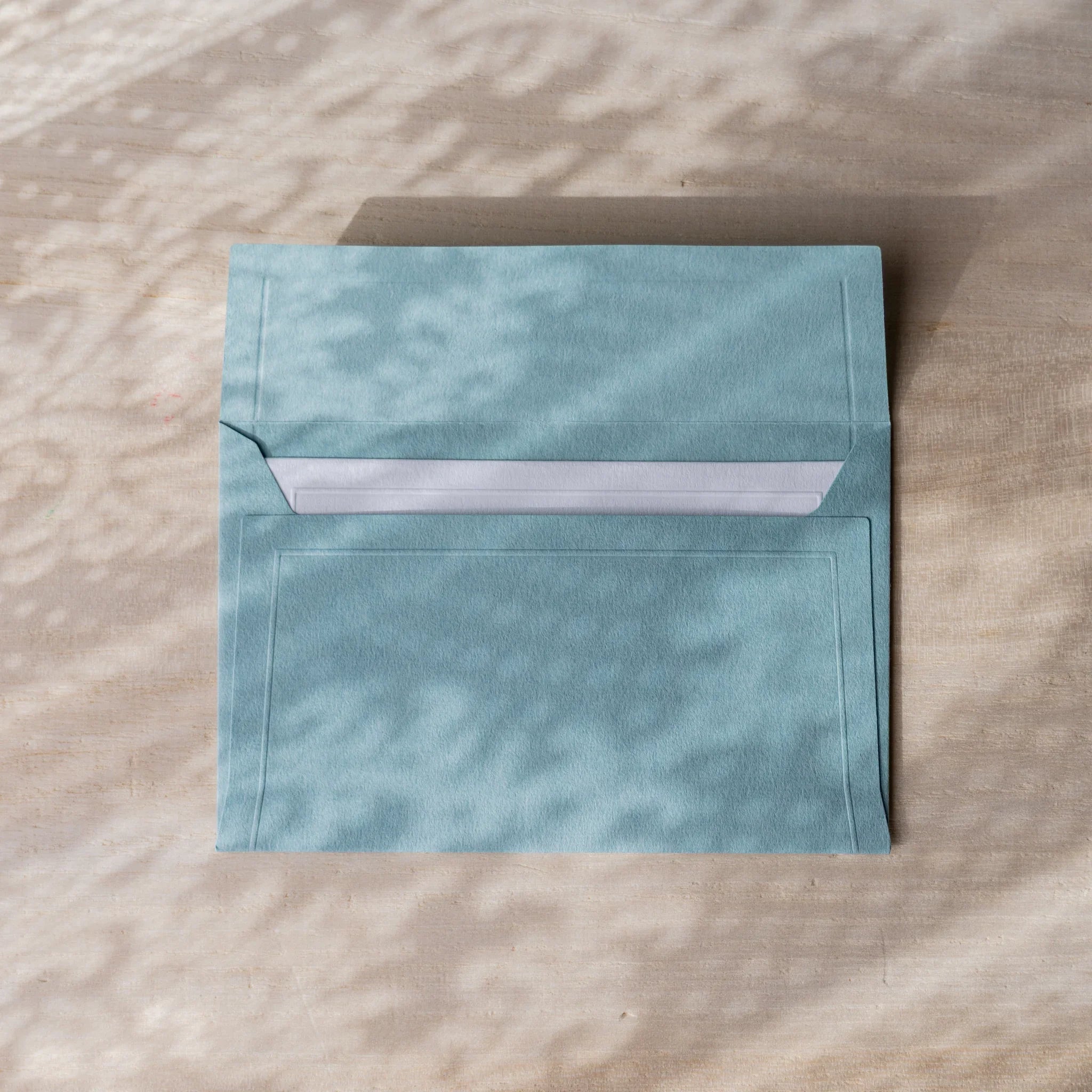 Dressco small embossed envelope set, multicolor shade, angled display with embos