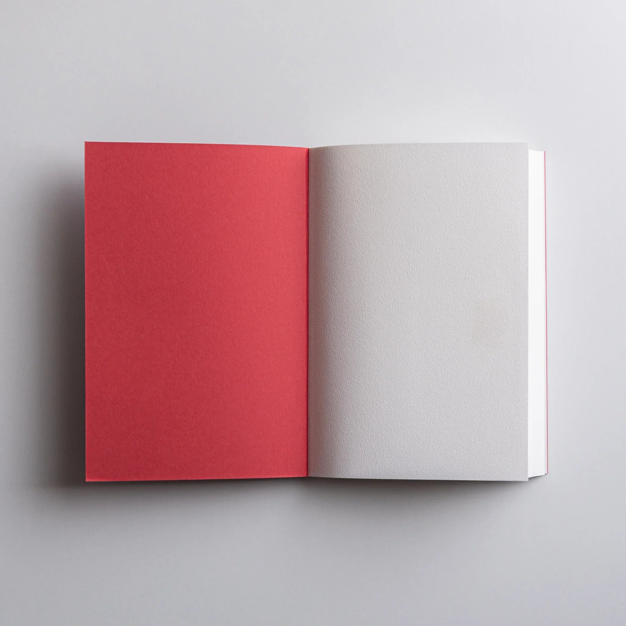 Textured surface detail of Dressco Onion Skin Paper A6 notebook variant showing cover material and print quality