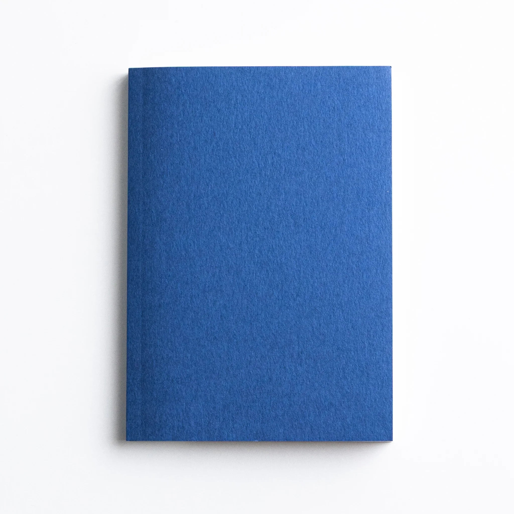 Front cover of Dressco Blue Onion Skin Japanese Notebook A6 in deep Magellan blue.