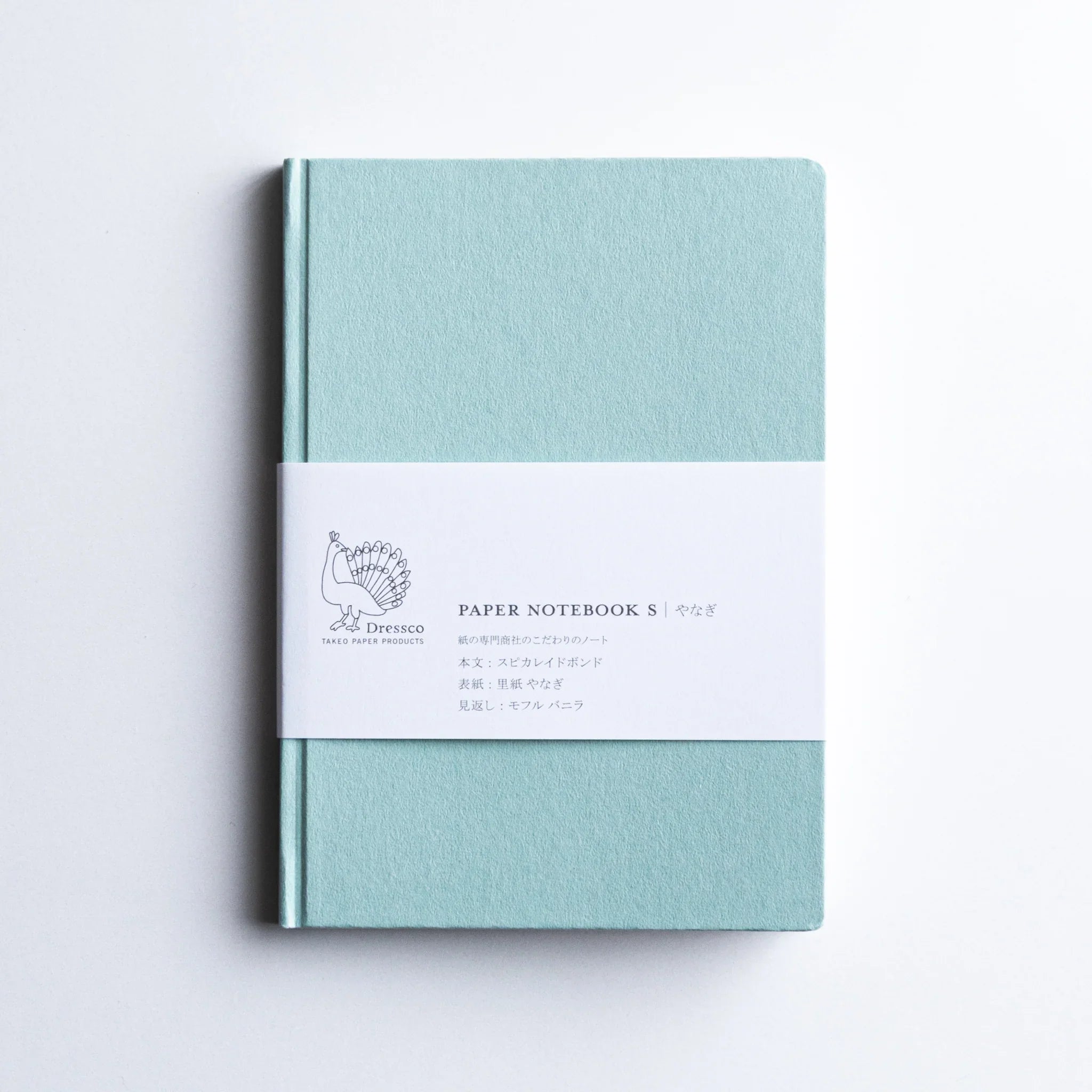 Front cover of Dressco Spica Laid Bond Paper Japanese Notebook in Willow Green with paper band.