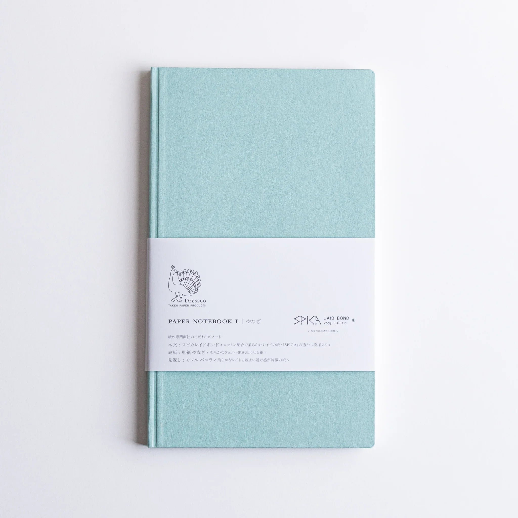 Dressco Spica Laid Bond Paper B6 notebook angled view revealing the stitched binding and laid bond paper texture