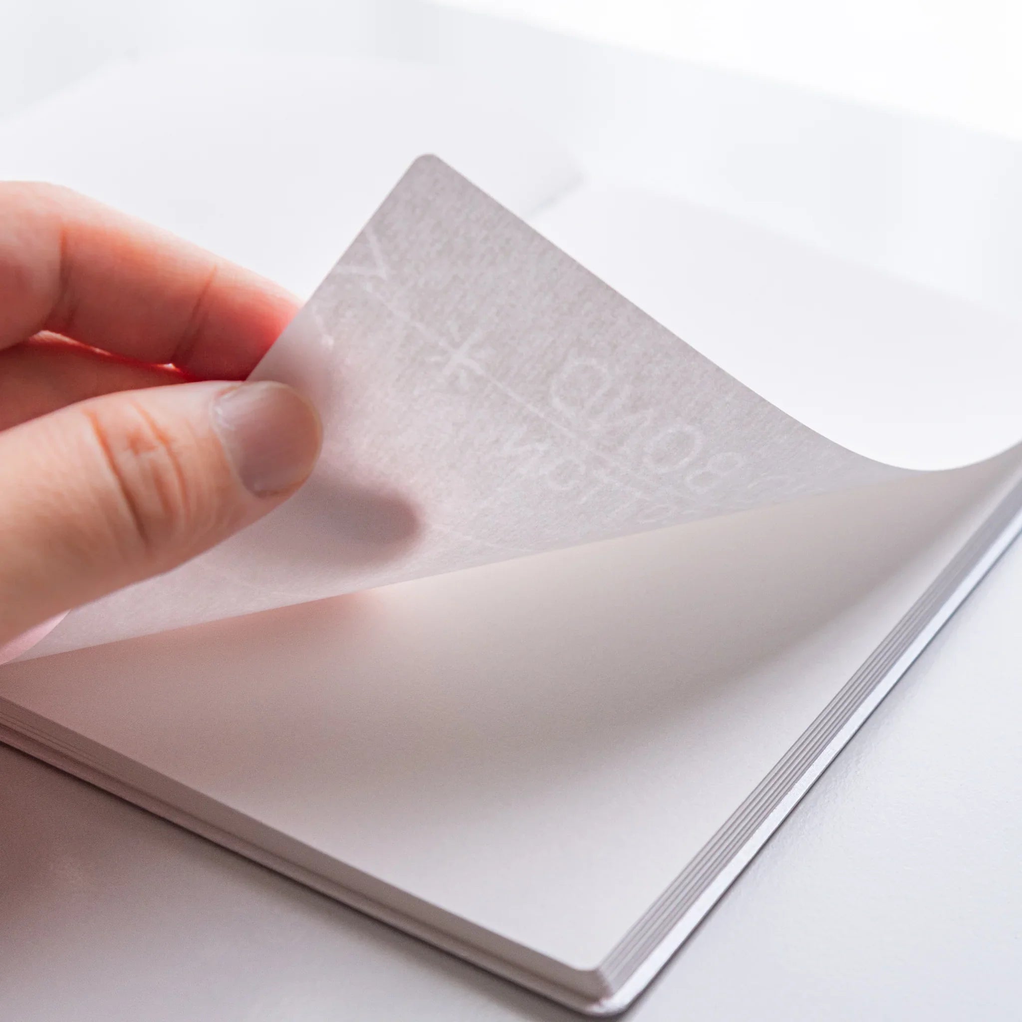 Multiple Dressco Spica Laid Bond Paper B6 notebook variants shown together displaying the full color collection