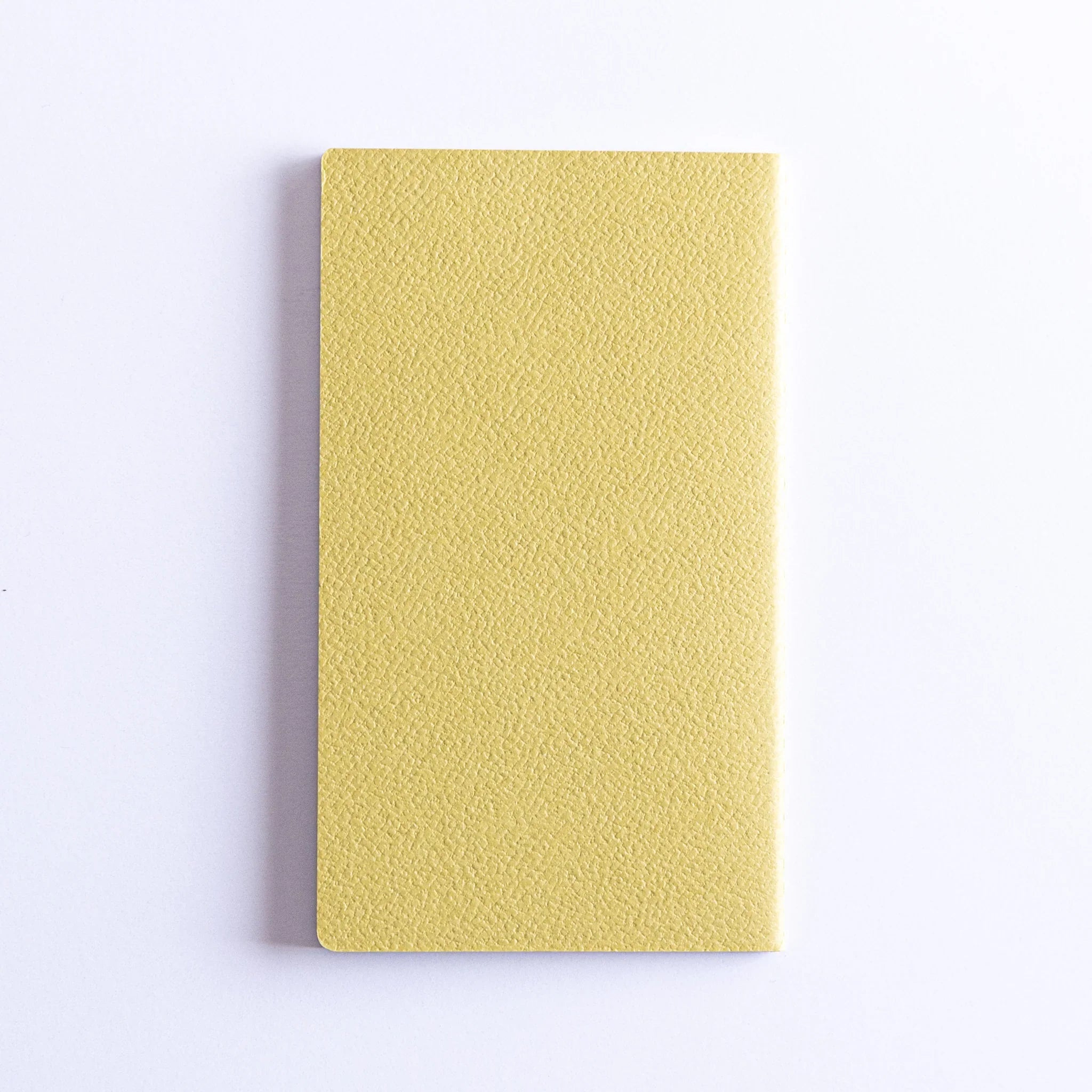 Closed Dressco Spica Laid Bond Japanese Notebook – Avocado textured cover.