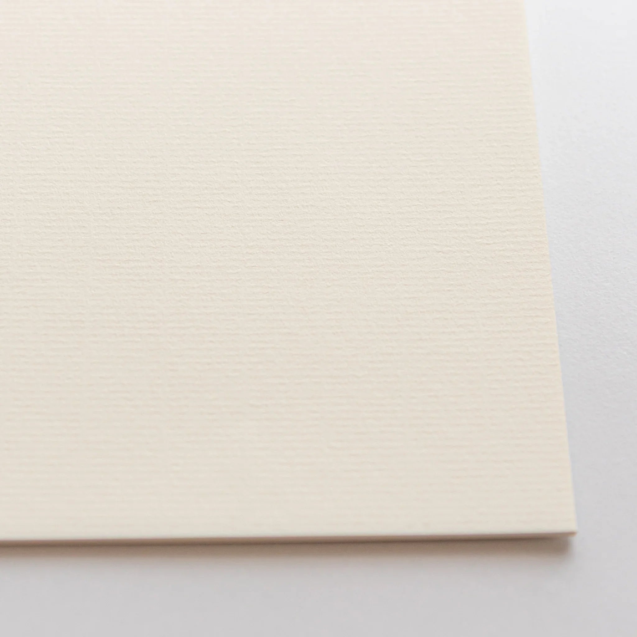 Detail of Strathmore writing pad cover showing visible brand text and watermark information clearly composition shown