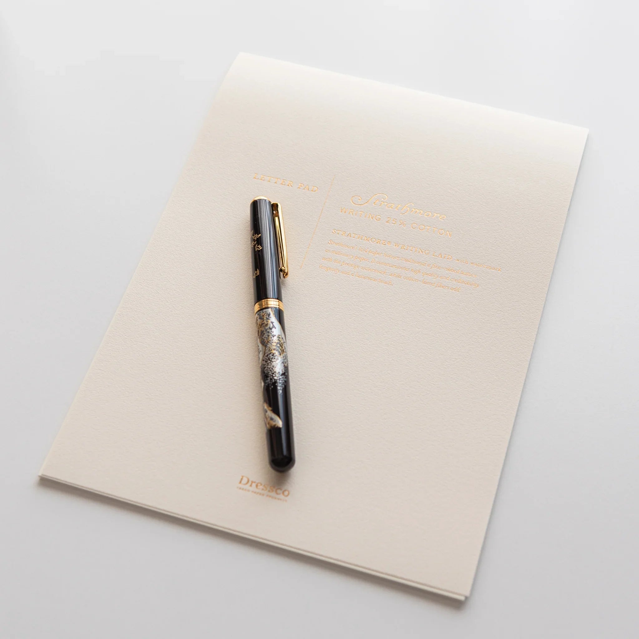 Japanese writing pad Strathmore Writing Laid N with decorative fountain pen on cream paper