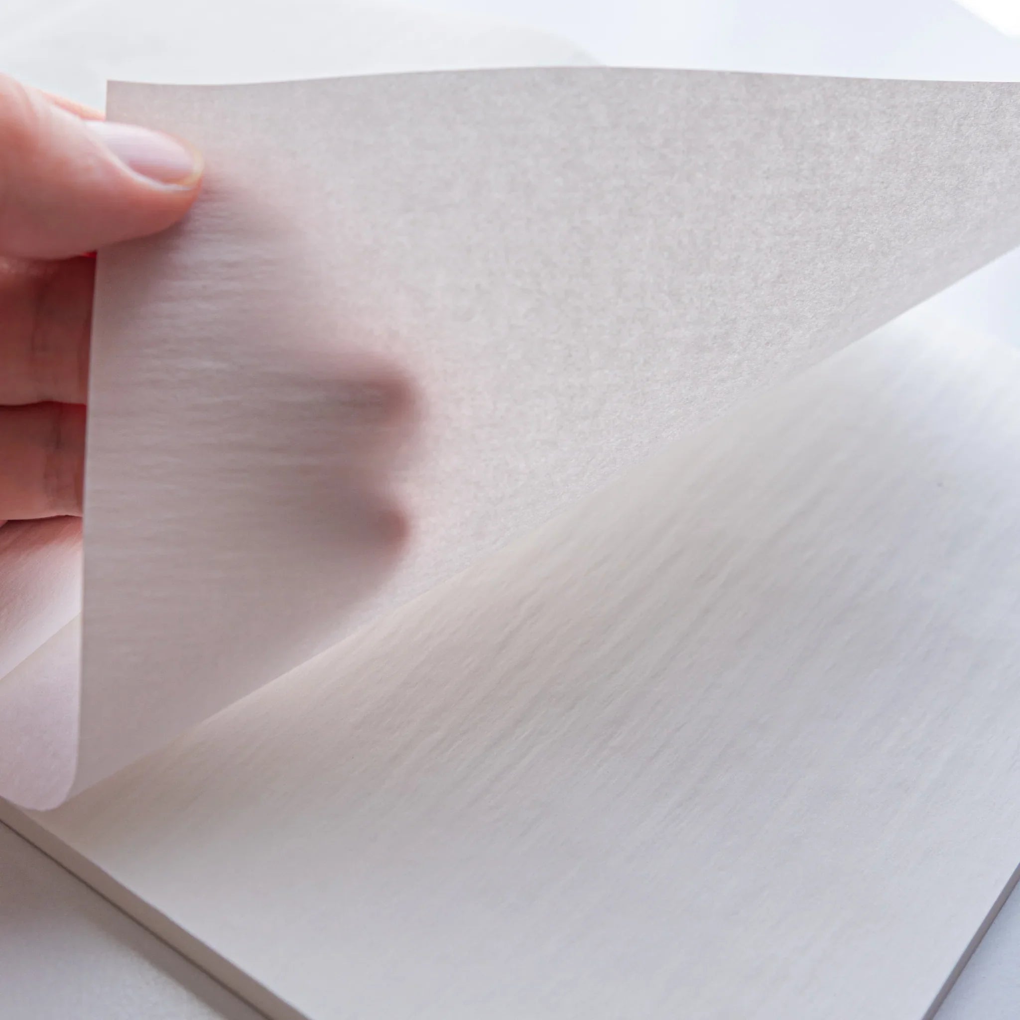 White notebook cover detail with KateJo and Dressco text clearly visible on information bands composition shown