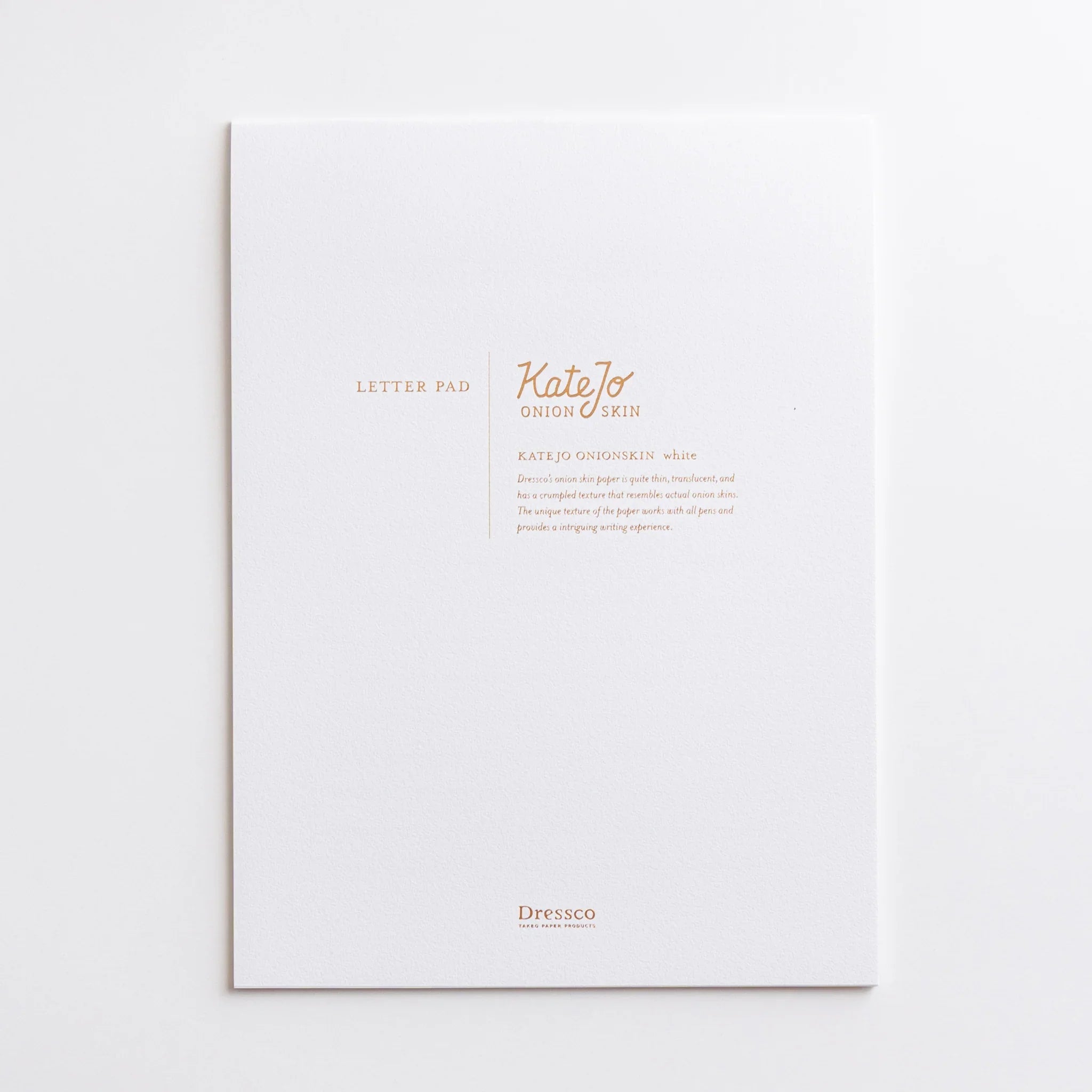 KateJo Onion Skin white writing pad with information bands and Dressco branding visible on cover composition shown