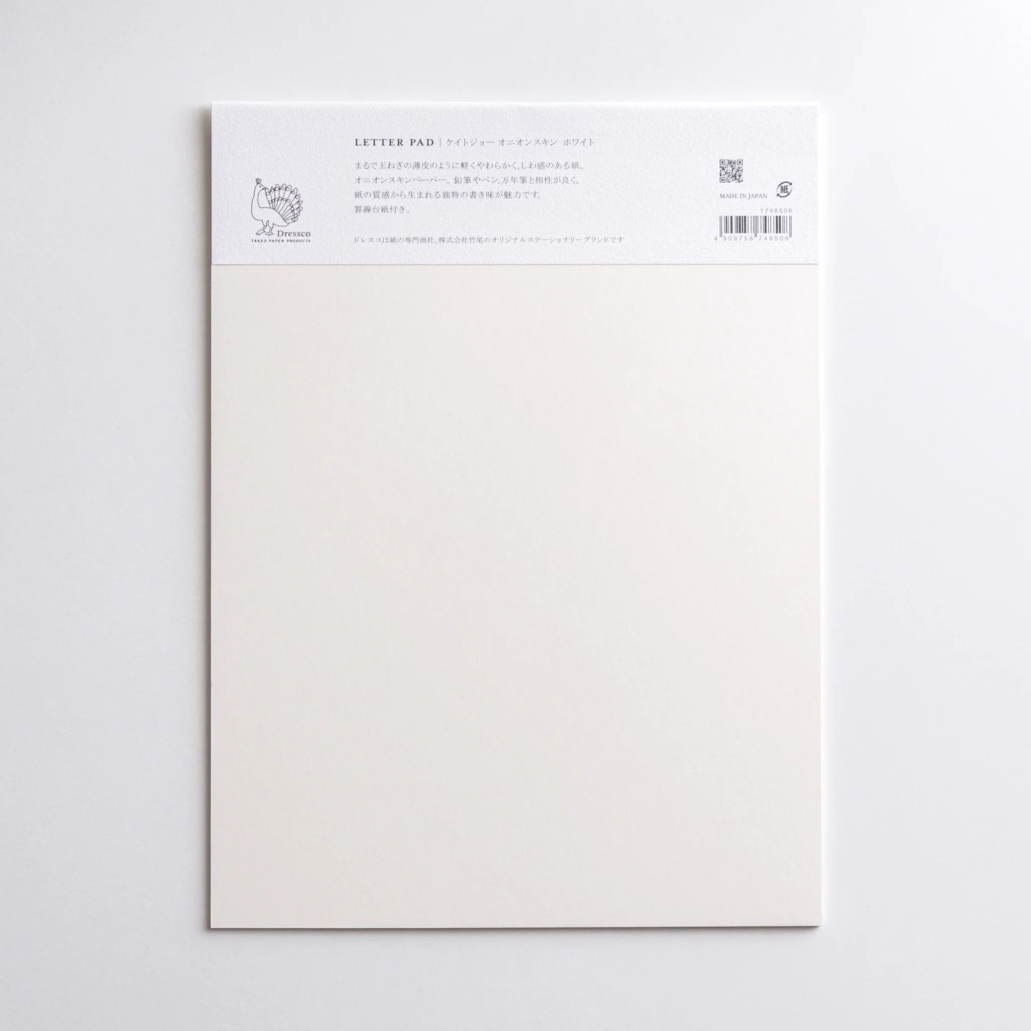 KateJo writing pad positioned at angle showing structure and band placement with cover visible composition shown