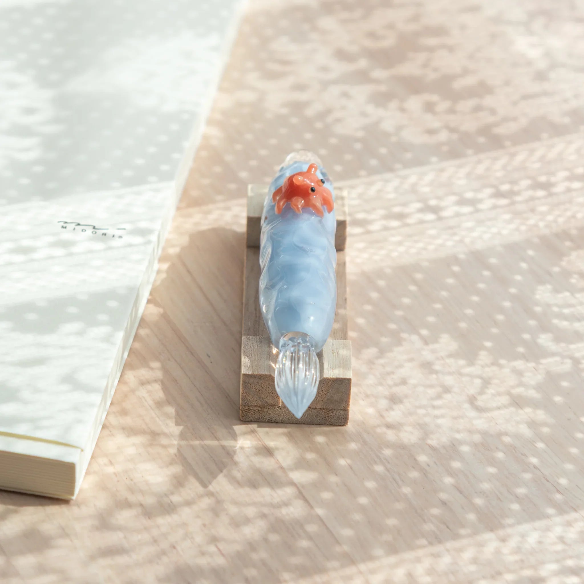 Glass dip pen with dumbo octopus design ideal for fantasy-inspired journaling and artistic expression