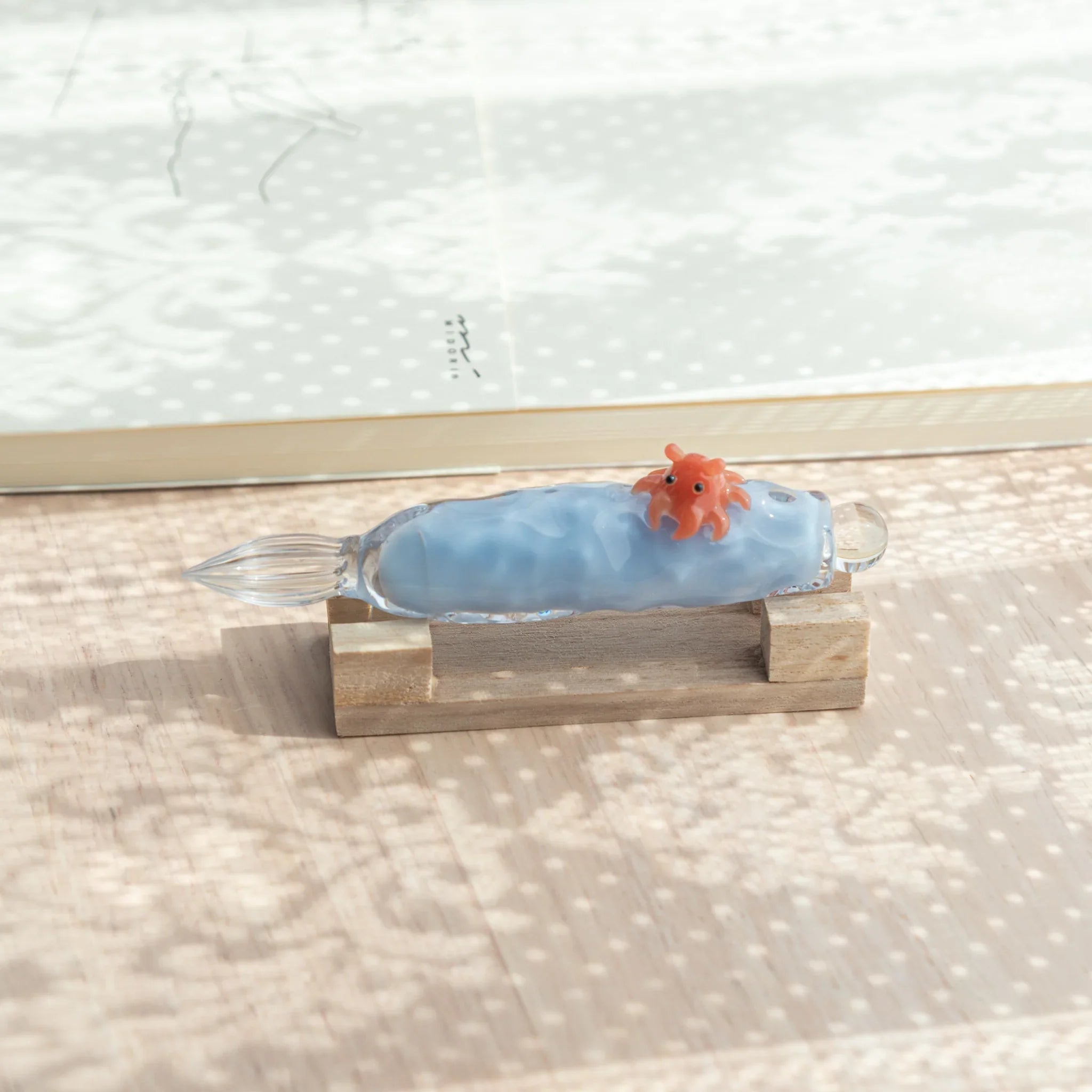 Whimsical dumbo octopus glass dip pen combining resin craft expertise with hand-blown glass components