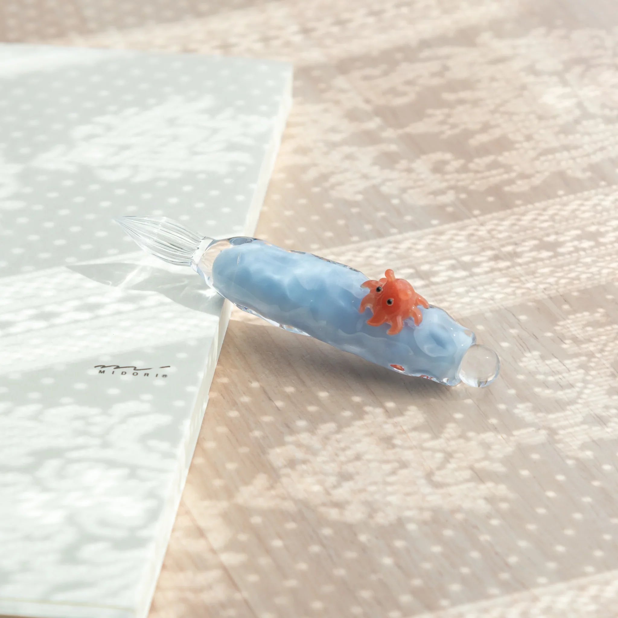 hand-made dumbo dip pen with detailed resin work with cute deep-sea character and hand-blown
