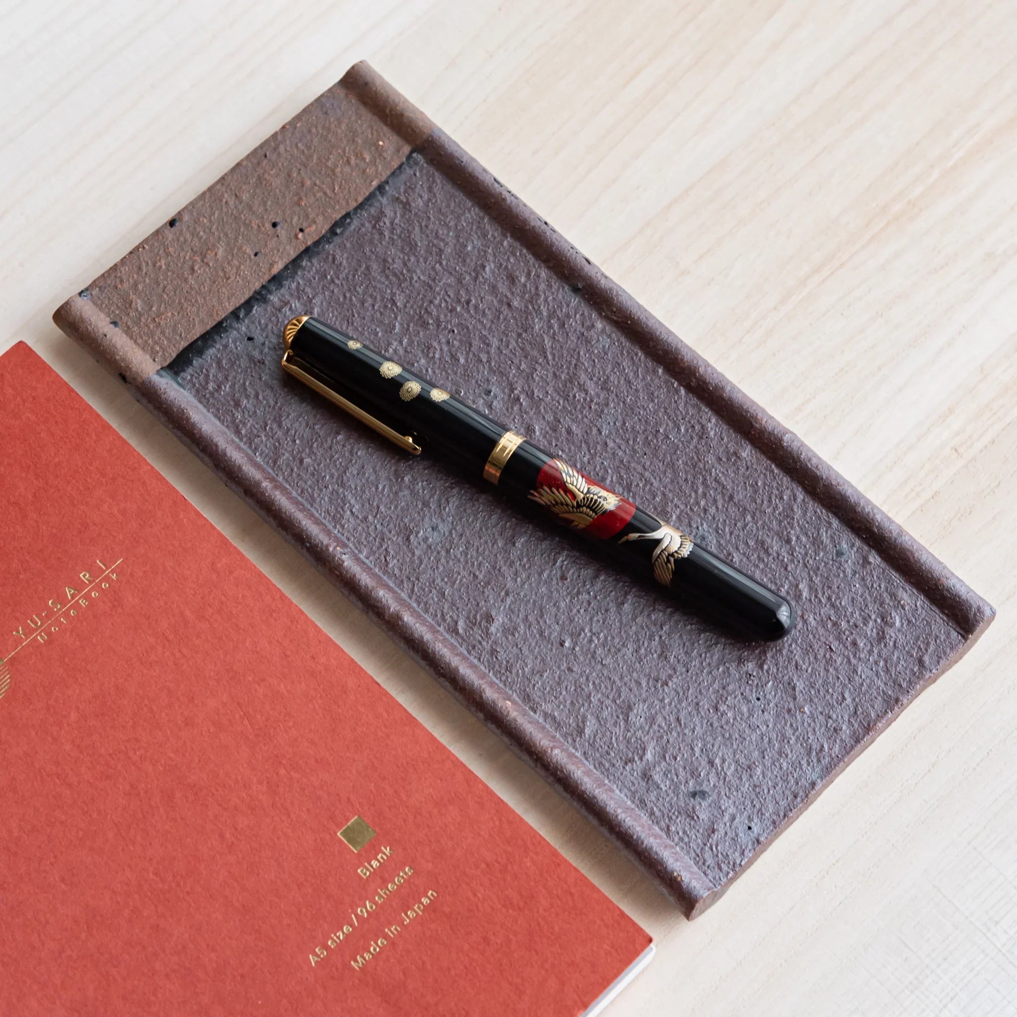 Echizen Kawara red tile ceramic pen tray with four slots shown in composition detail shown in composition