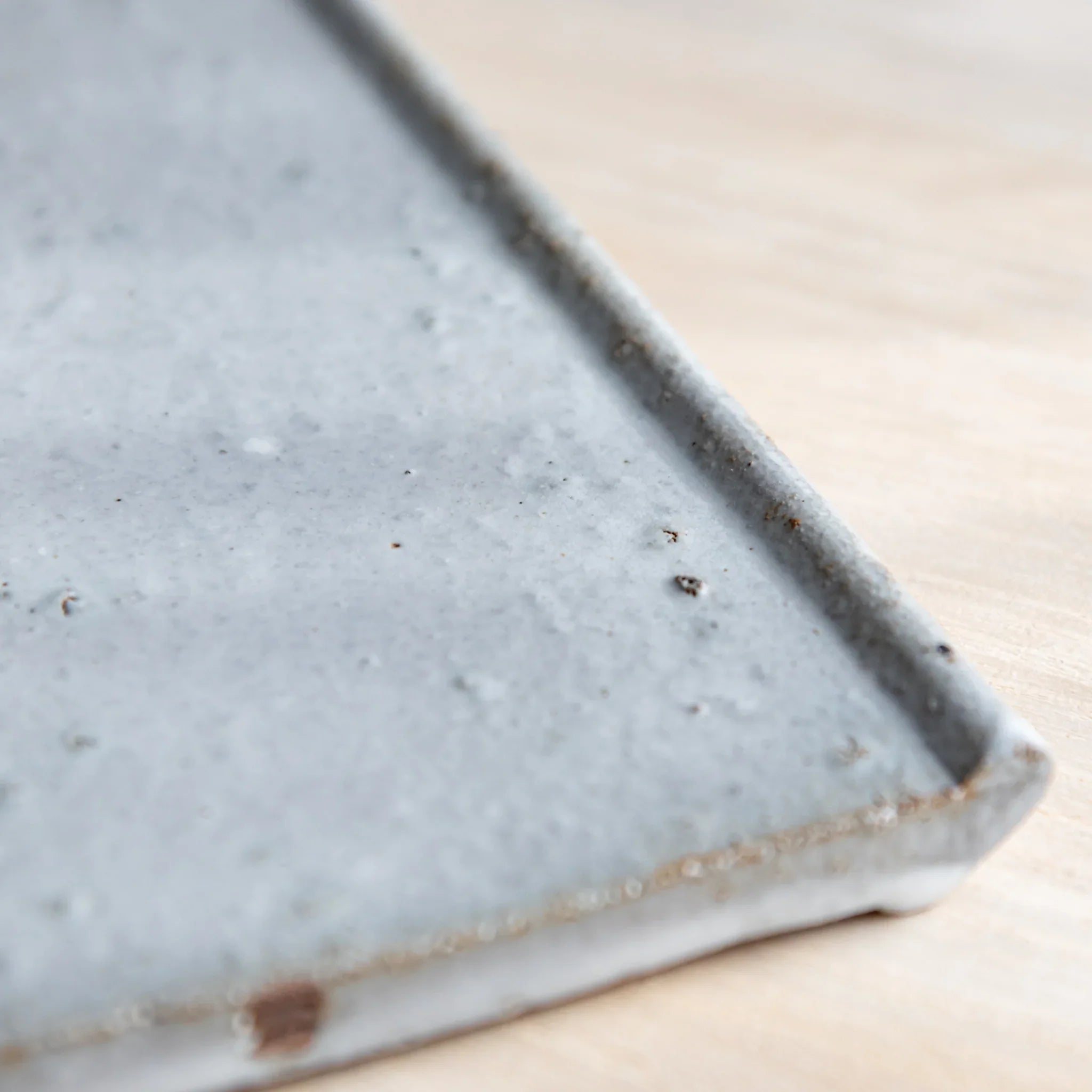 Echizen Kawara ceramic tray detail showing white glaze finish characteristics and surface clearly visible