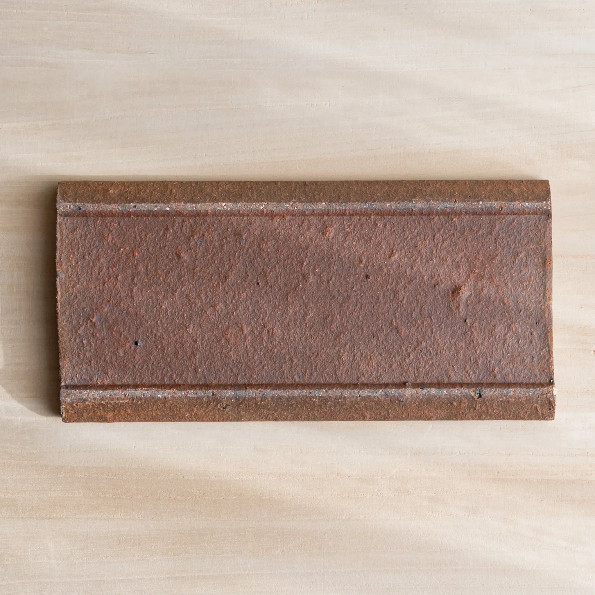 Echizen Kawara yakishime clay ceramic pen tray with four slots shown in composition detail displayed composition view