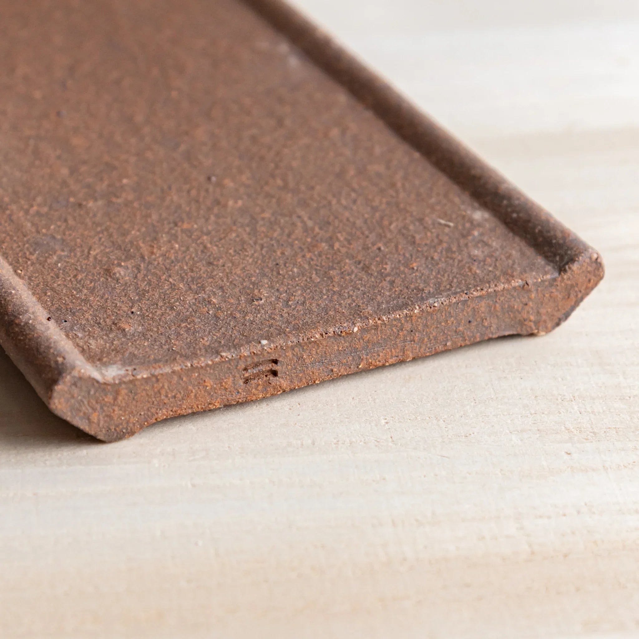 Echizen Kawara yakishime clay ceramic pen tray with four slots shown in composition detail in detail view composition