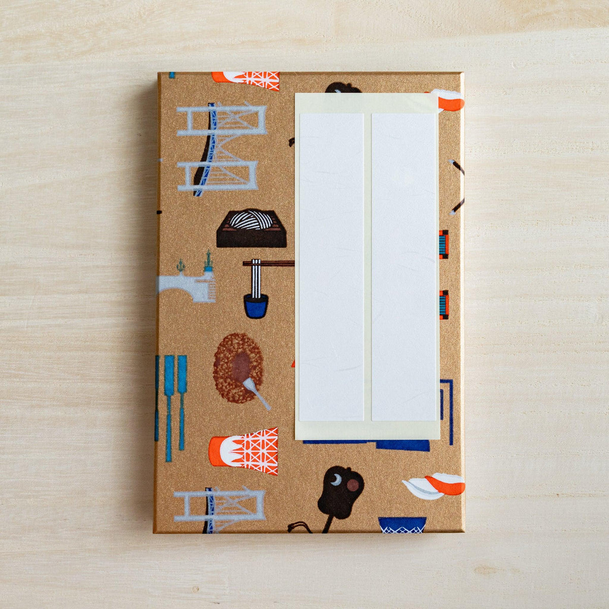 Edo Tokyo goshuincho stamp book gold cover with two blank white paper title labels placed on it
