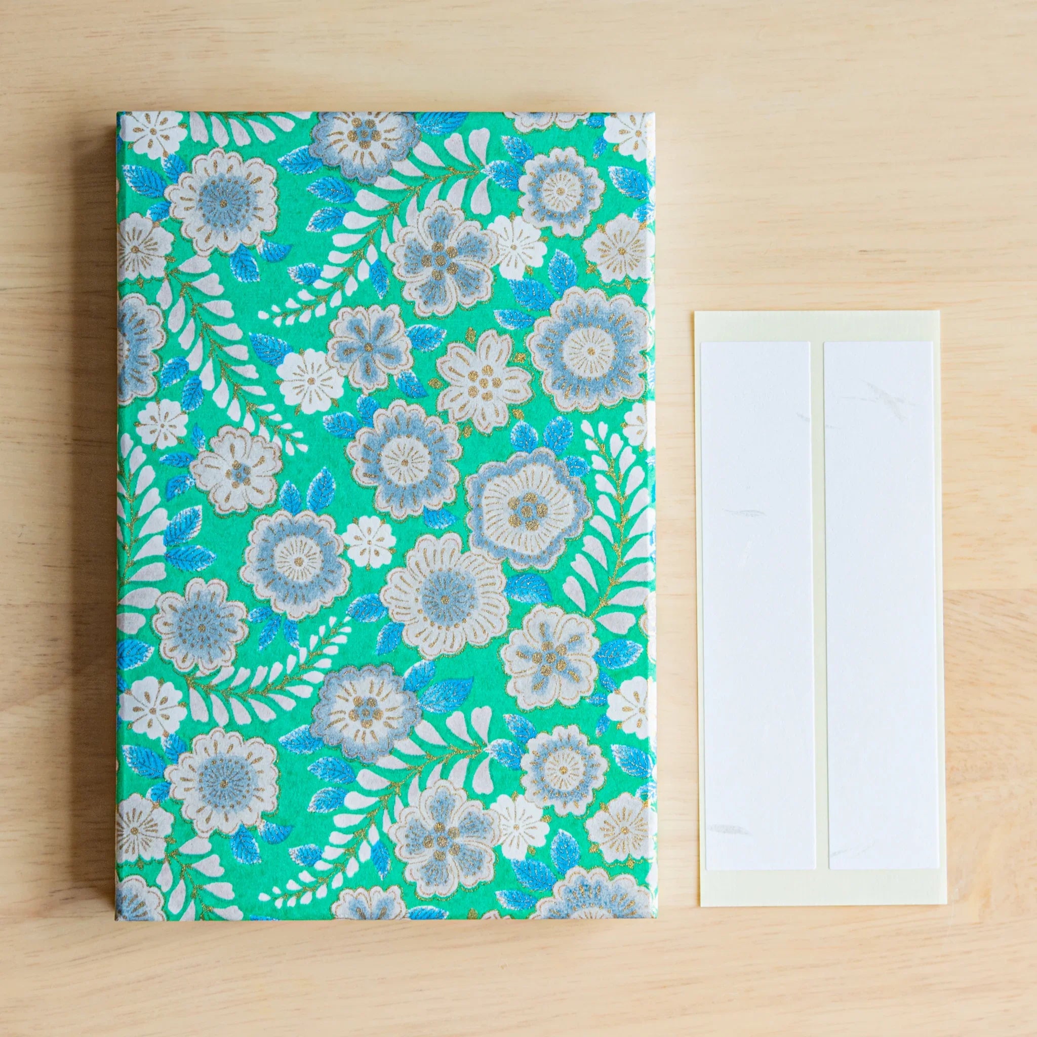 Emerald Green Washi Goshuincho Stamp Book angled view showing rich forest green cover botanical pattern