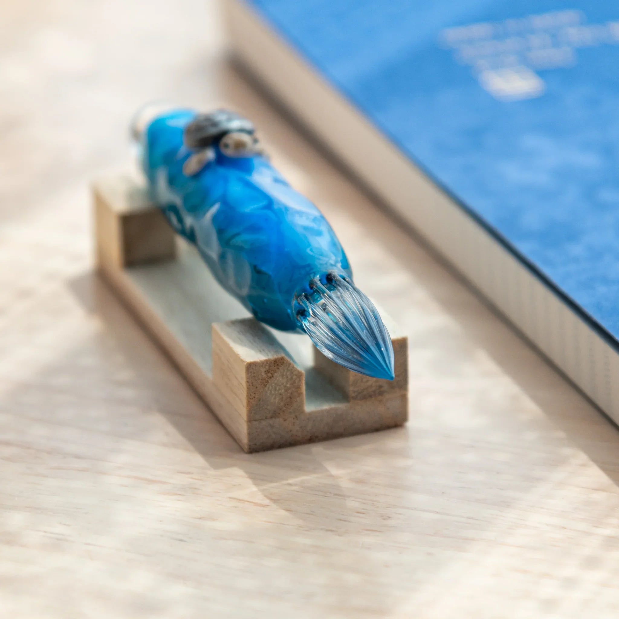 Glass dip pen featuring enclosed floating sea turtle inside transparent barrel, detailed hand-made design