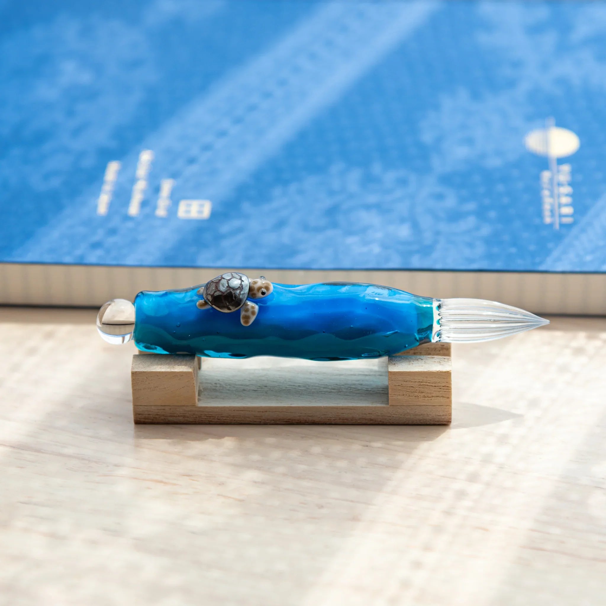 Glass dip pen with decorative floating sea turtle enclosed inside transparent barrel, Japanese writing tool