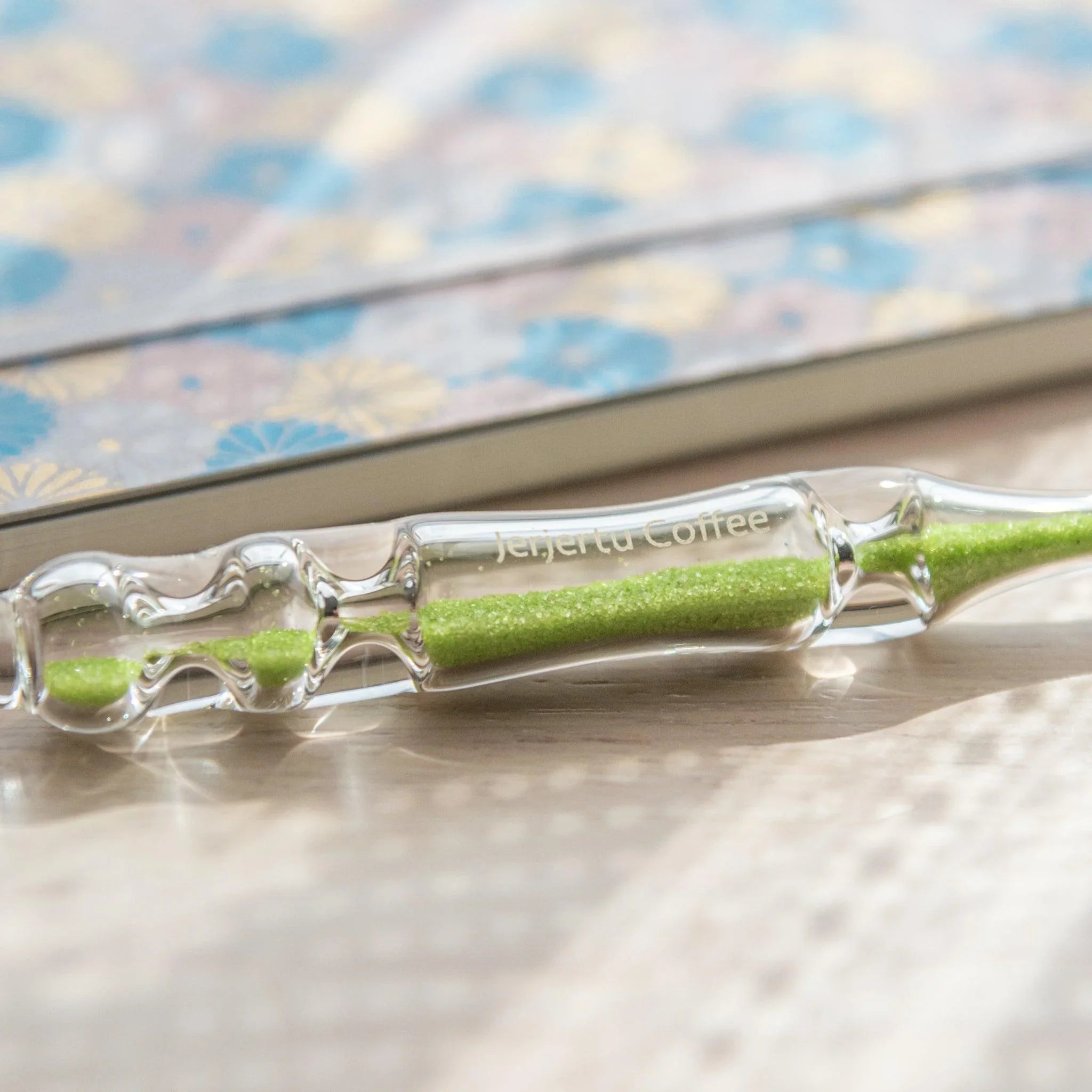 Fresh Green Hourglass Glass Dip Pen close-up of green-tinted interior chambers in hourglass form within glass barrel