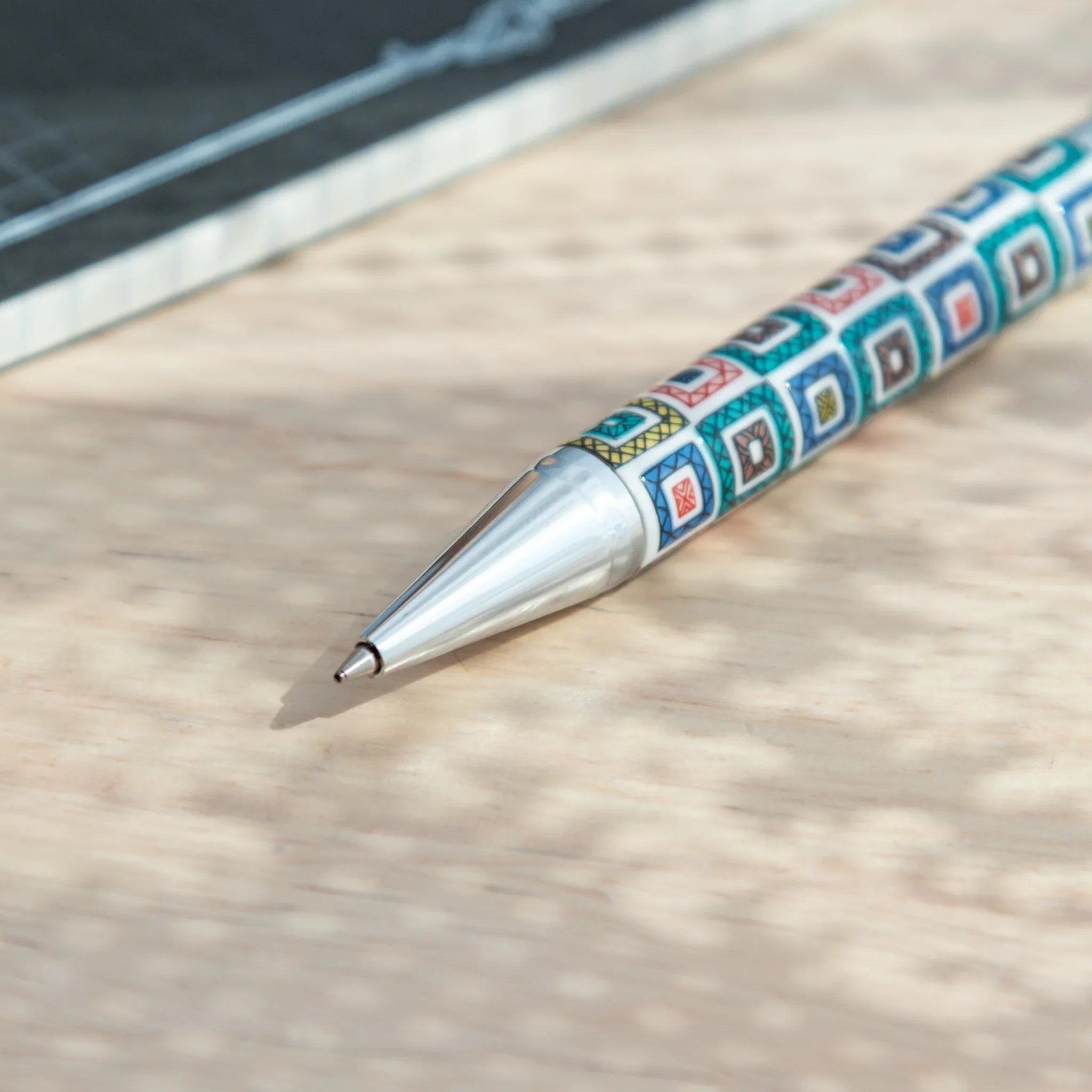 Decorative Kutani ceramic ballpoint pen with intricate tile pattern for writing featuring traditional porcelain