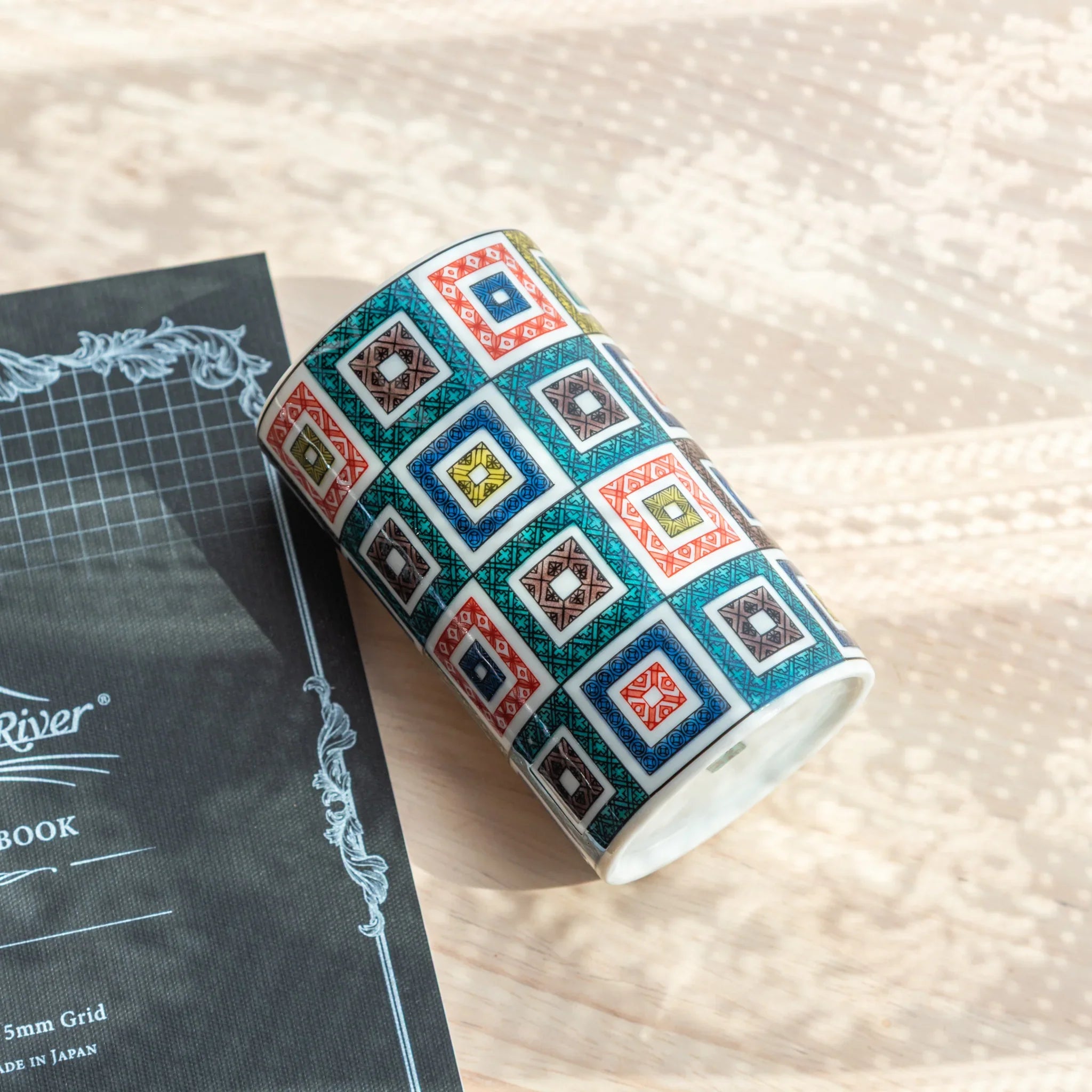 Geometric tile Kutani ceramic pen holder, traditional Japanese cloisonne-style patterned exterior design