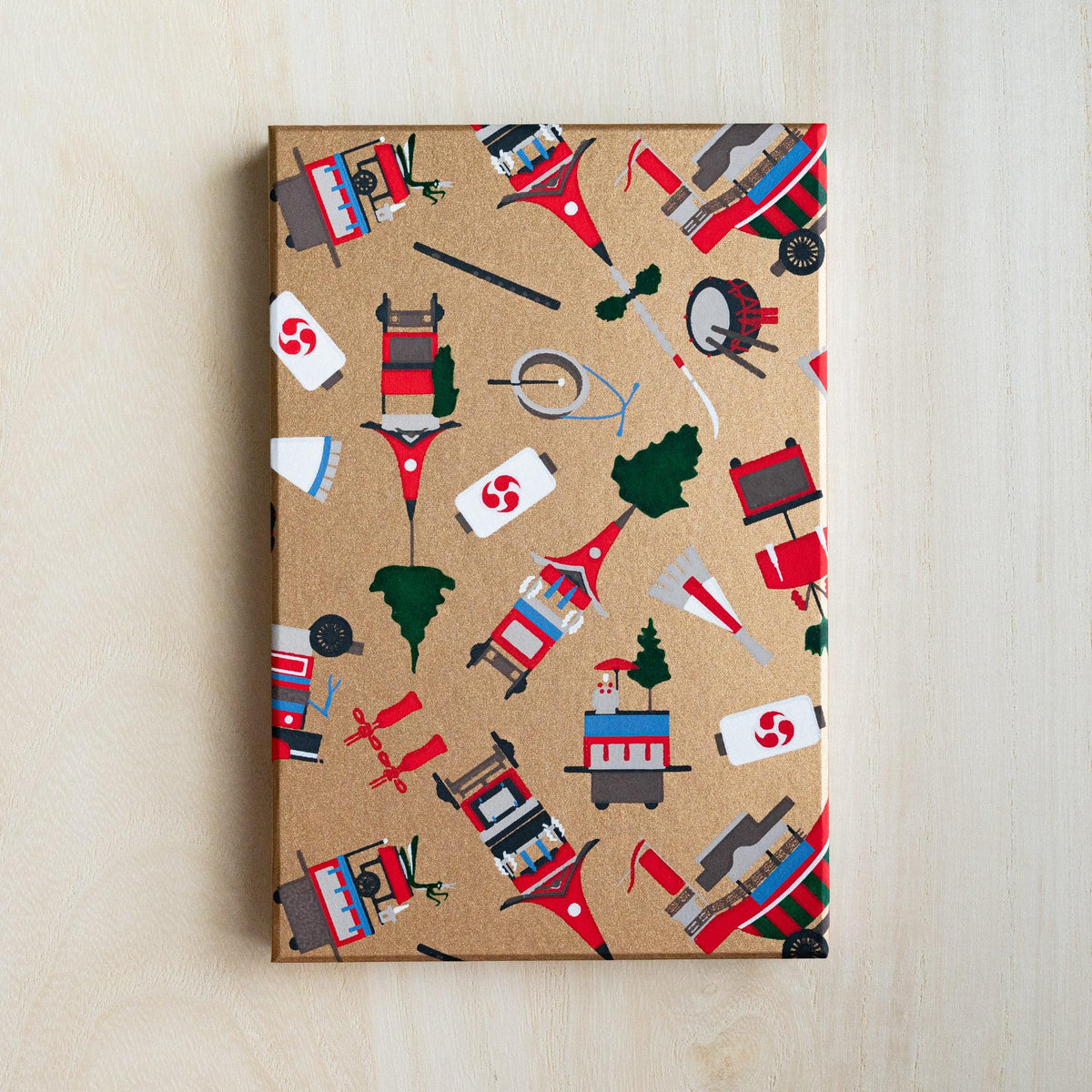 Gion Kyoto goshuincho stamp book cover in gold washi with red floats, pine trees and taiko drums