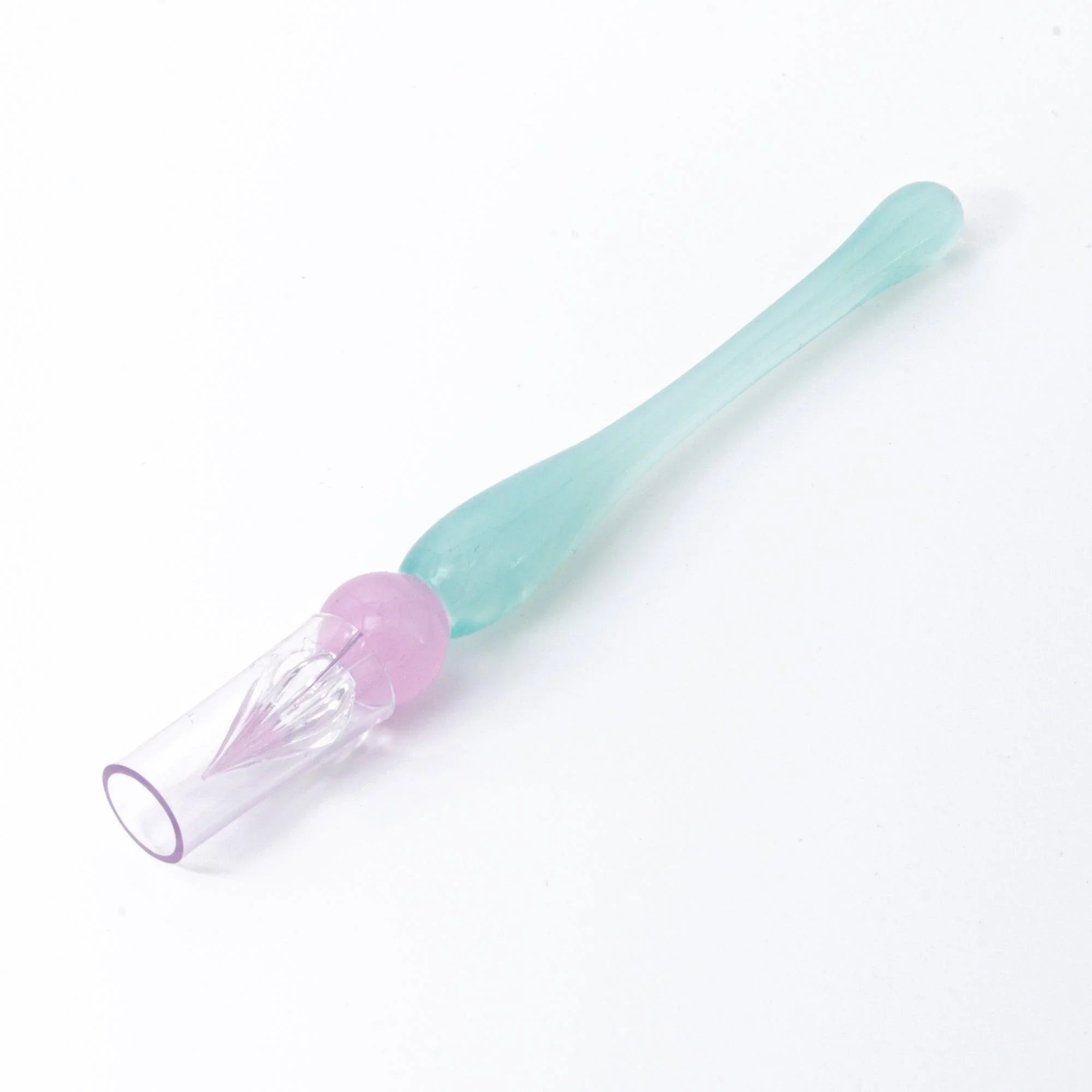 Glamorous Short Kikirara glass dip pen diagonal view revealing complete nib base, ferrule, and mint handle structure