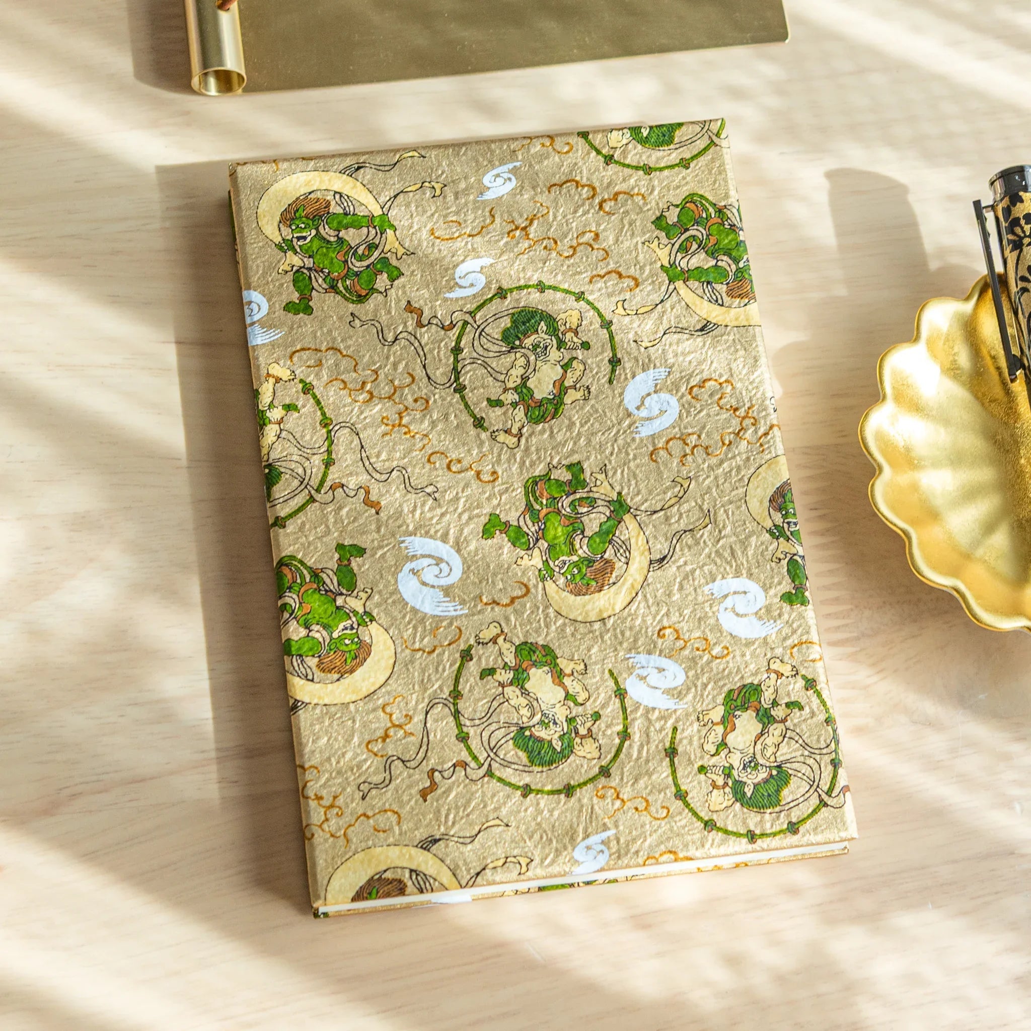 Gods of Wind and Thunder Washi Goshuincho stamp book with blue washi cover and deity pattern on roll
