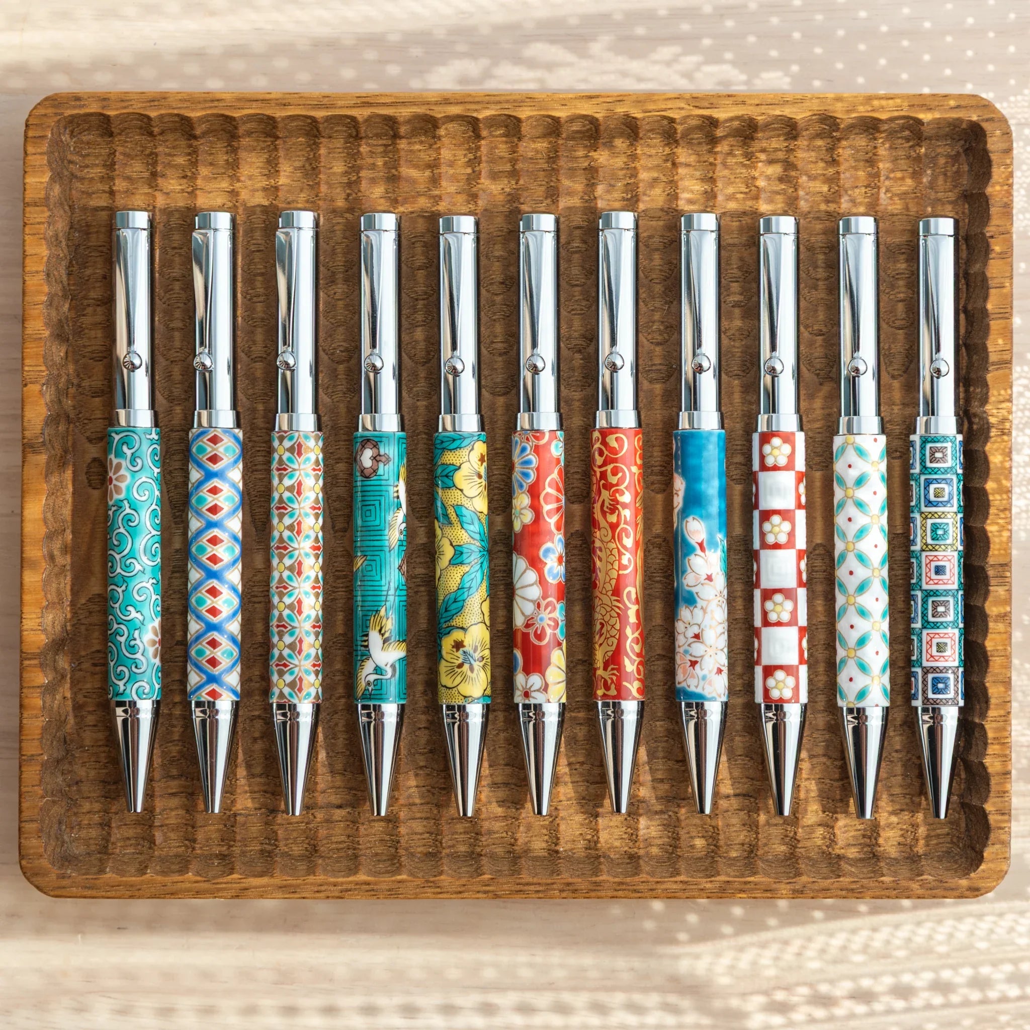 Luxury Kutani ceramic ballpoint pen showcasing plum blossom checkered pattern in colors featuring traditional porcelain
