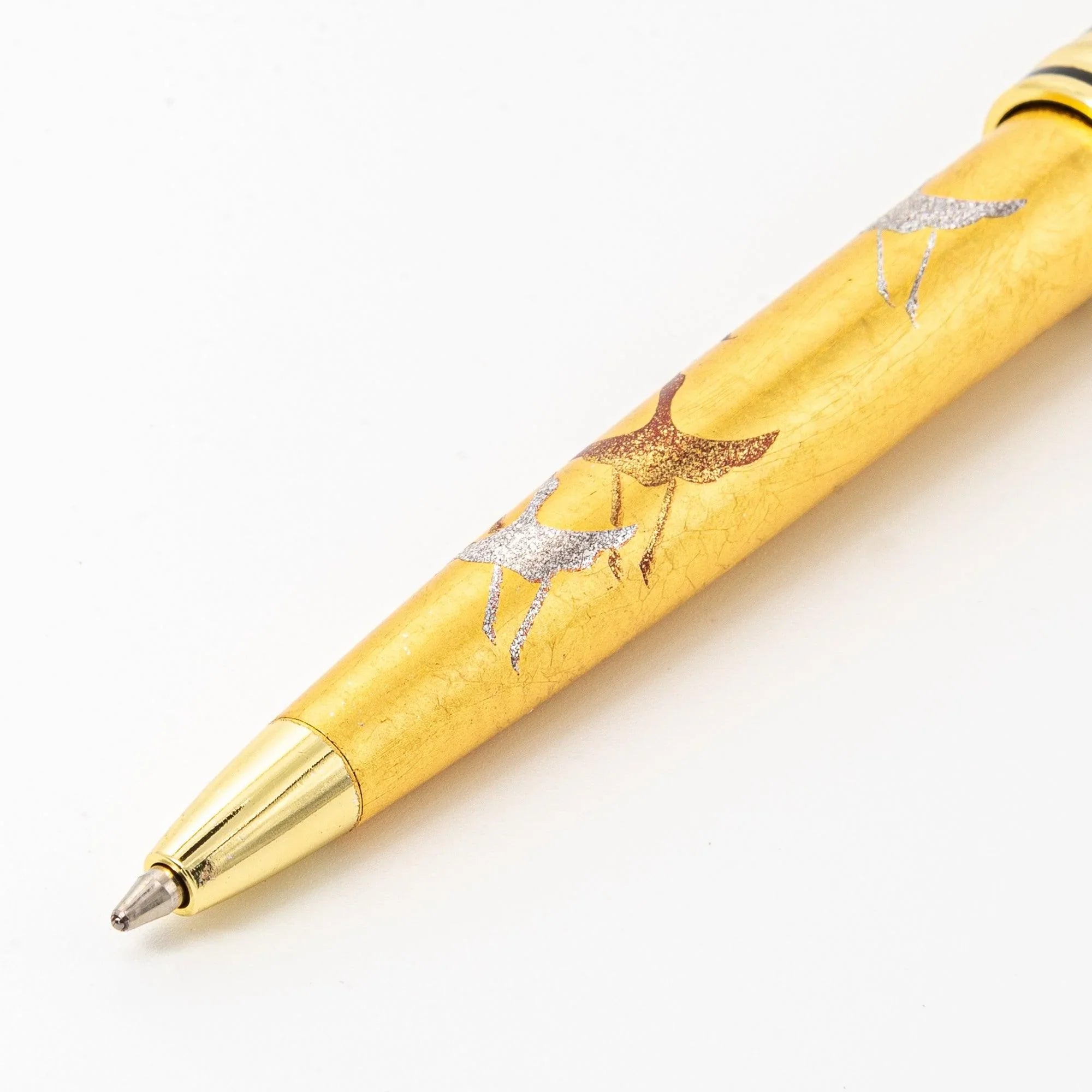 Pen tip detail Gold Leaf Crane Makie ballpoint showing ballpoint mechanism below ornate crane makie decoration