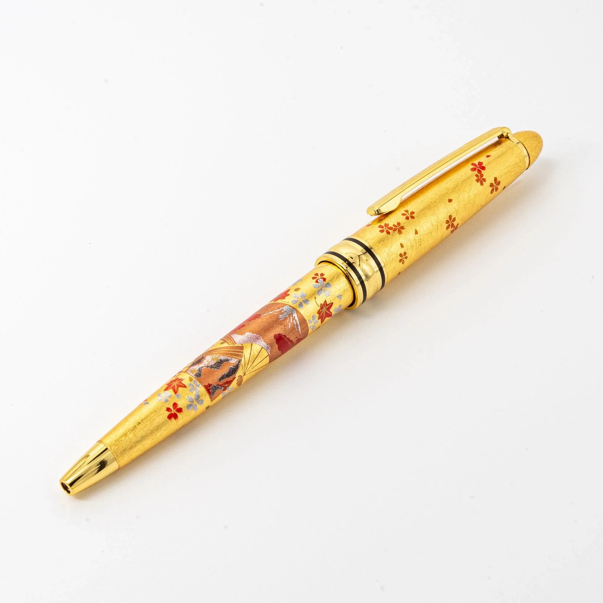 Uncapped Gold Leaf Japanese Fan Makie ballpoint pen displaying traditional folding fan motif in gold makie