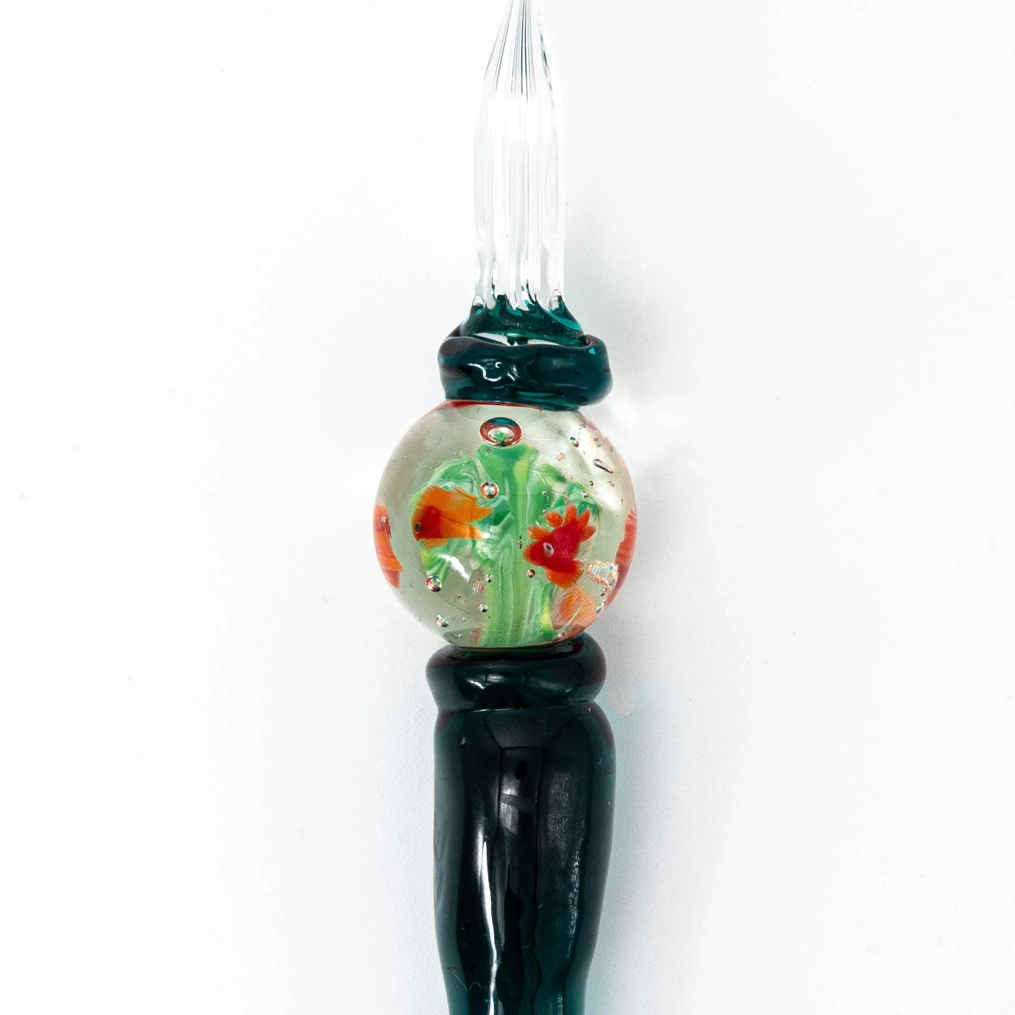 Japanese glass dip pen front view with goldfish aquarium barrel topped by teal glass cap, dip nib visible