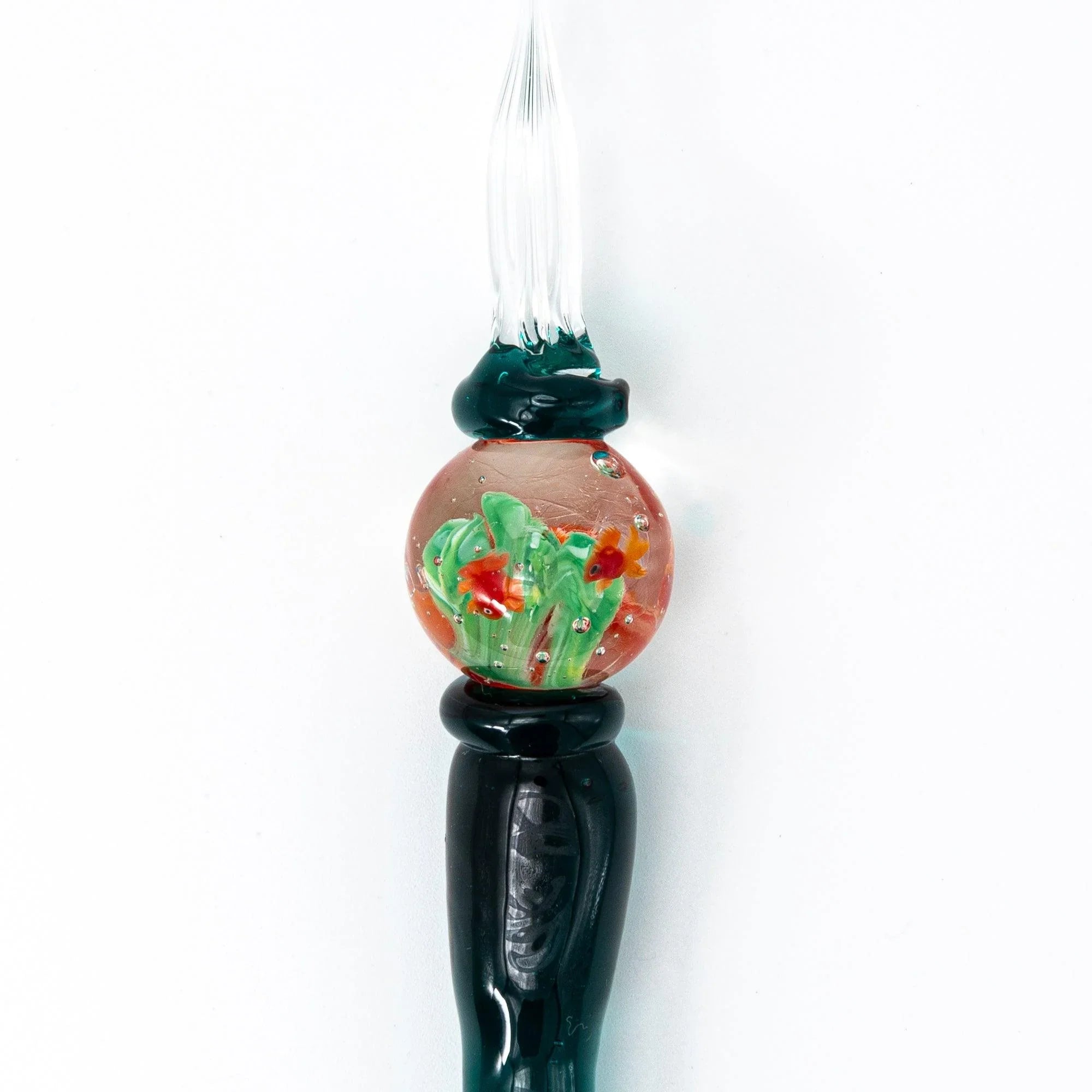 Japanese glass dip pen with goldfish aquarium barrel section filled with orange fish and green aquatic plant details