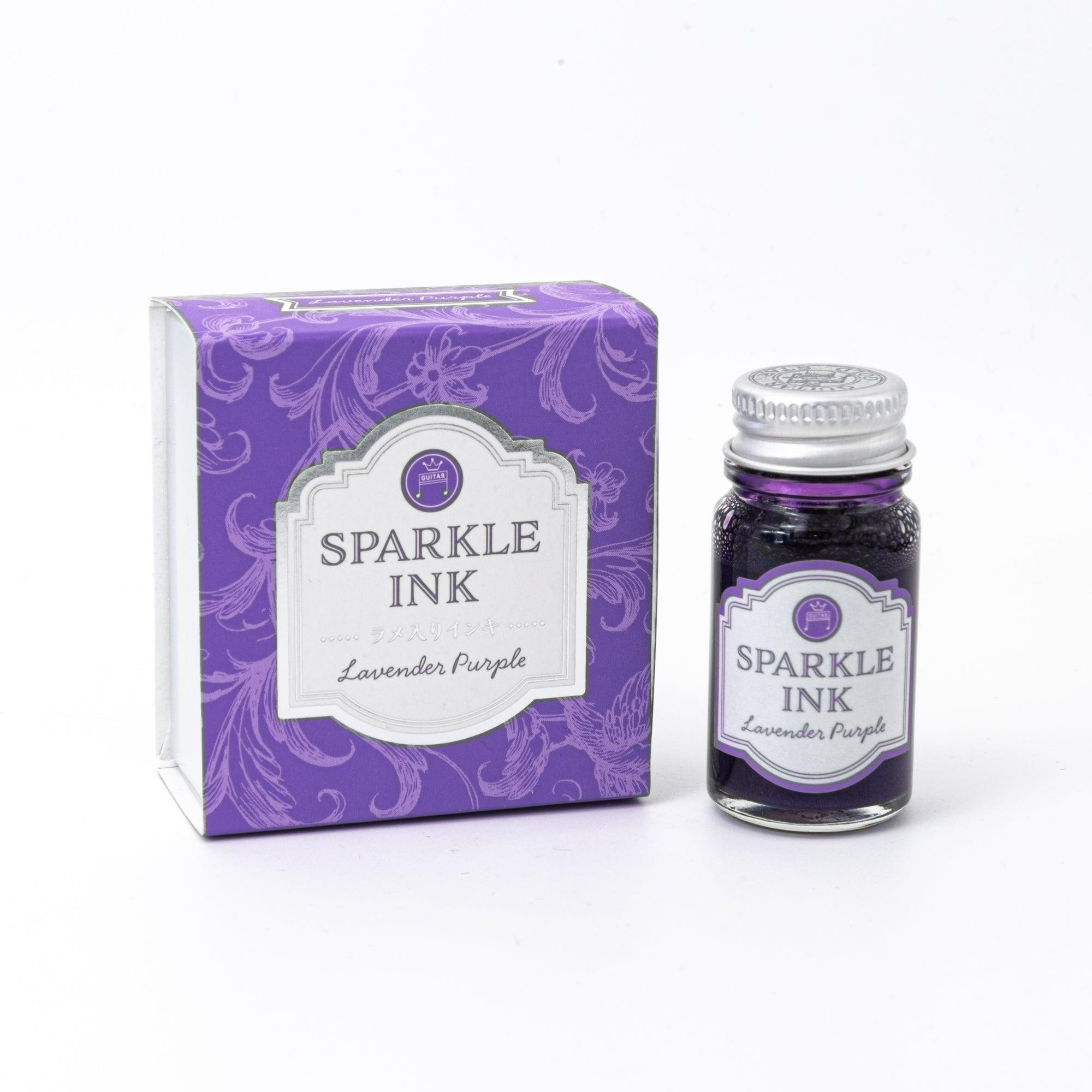 Sparkle Ink in Lavender Purple, presented in a glass bottle with a matching purple box featuring elegant floral motifs and refined typography.