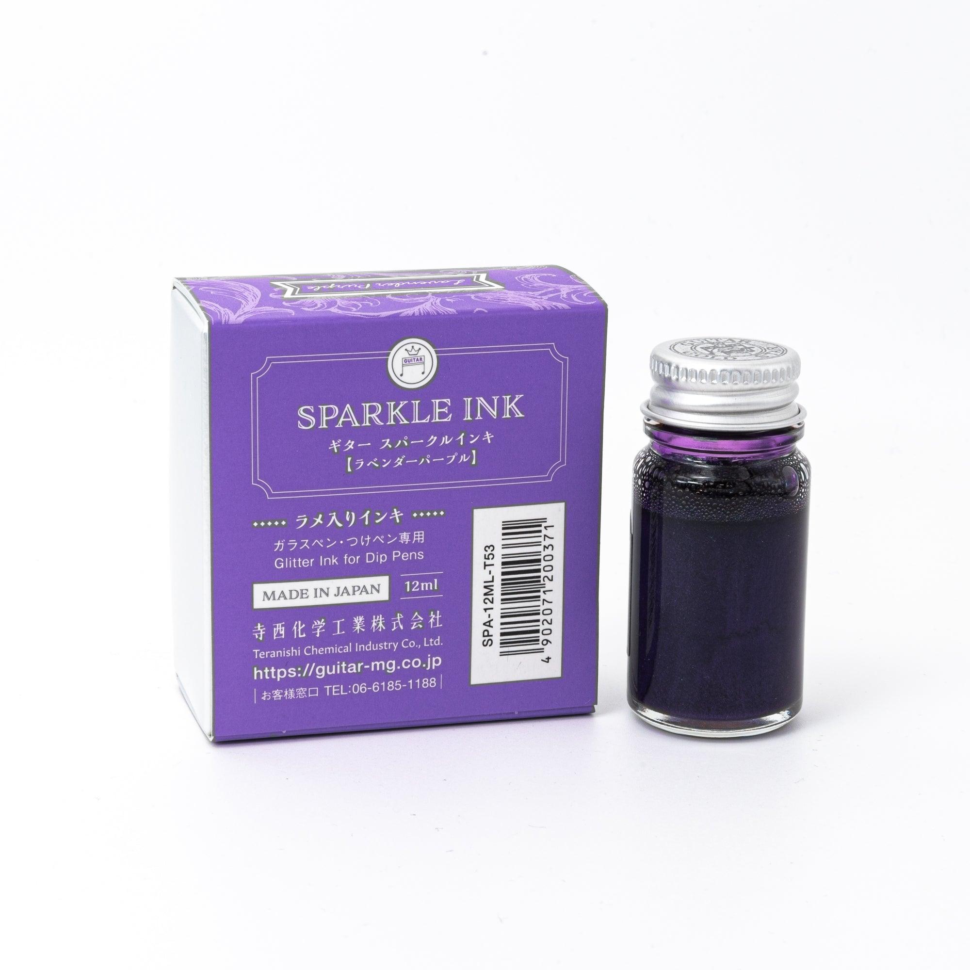 Sparkle Ink in Lavender Purple, presented in a glass bottle with a matching purple box featuring elegant floral motifs and refined typography.