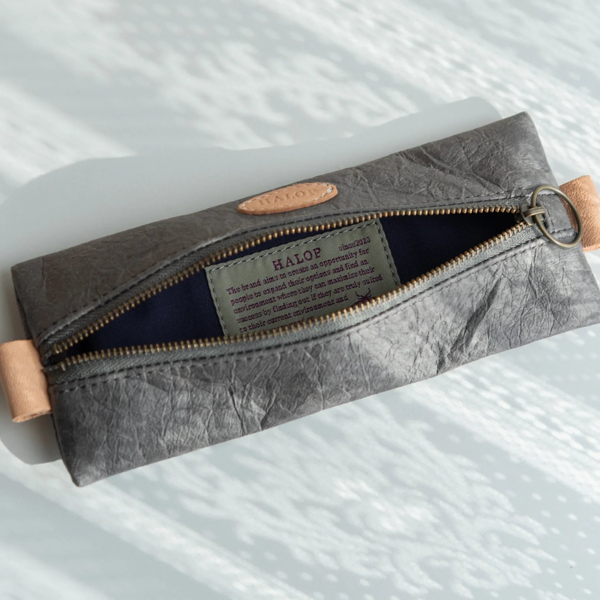 Handcrafted gray Sugihara case showing paper quality and craftsmanship shown in composition composition