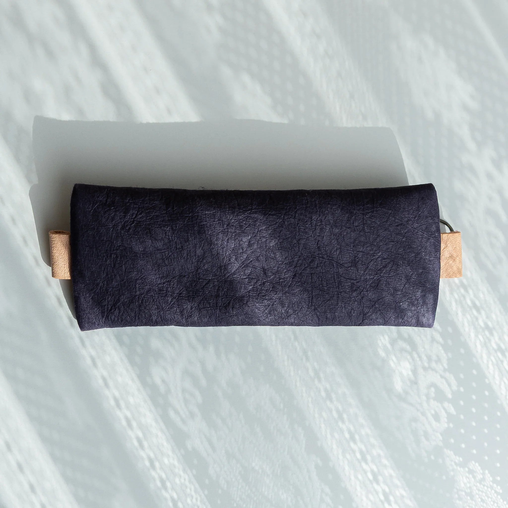 Washi paper pen case in purple showing folded construction and detail and composition in composition