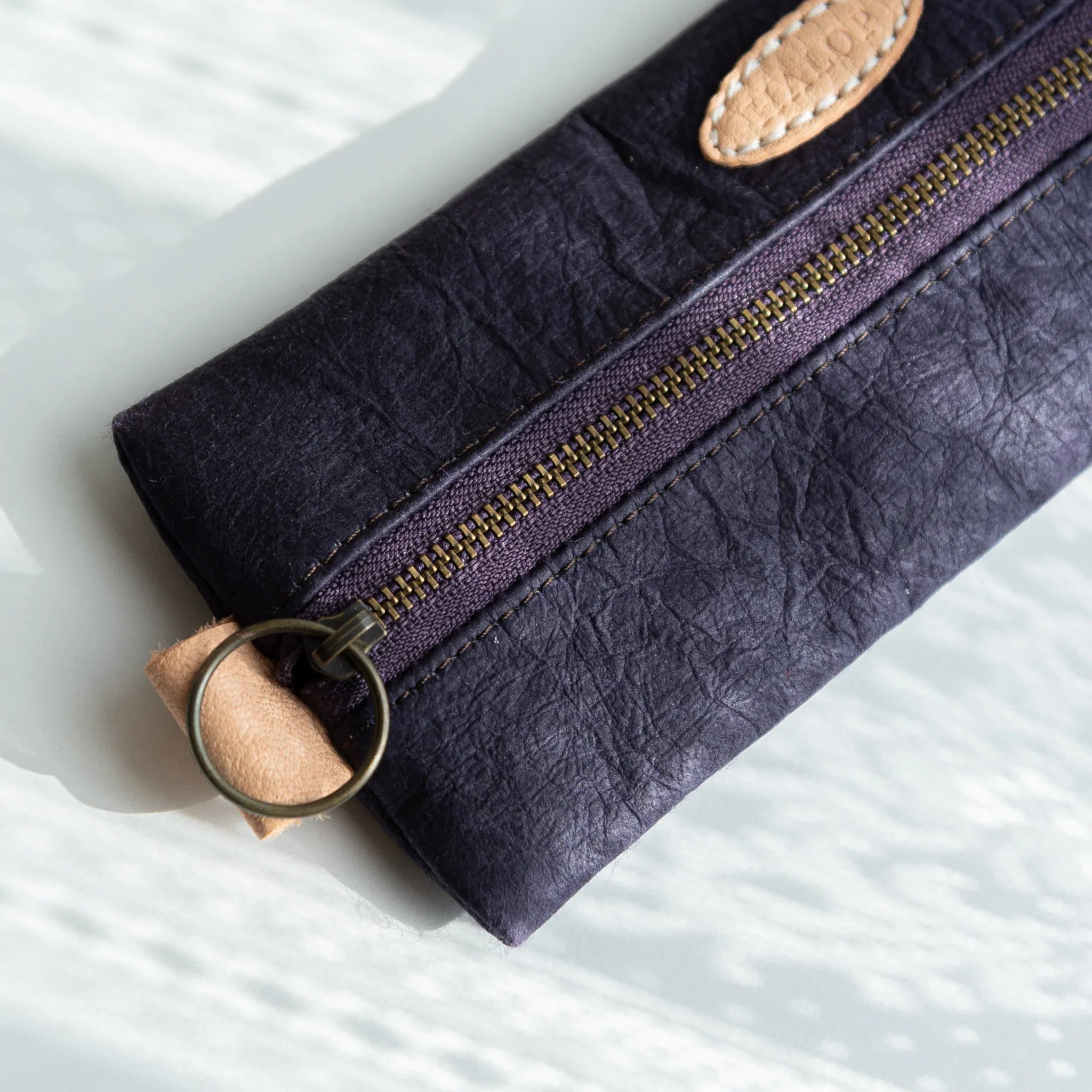 Purple Sugihara pen case detail showing washi paper texture and quality displayed clearly with hand-dyed finish