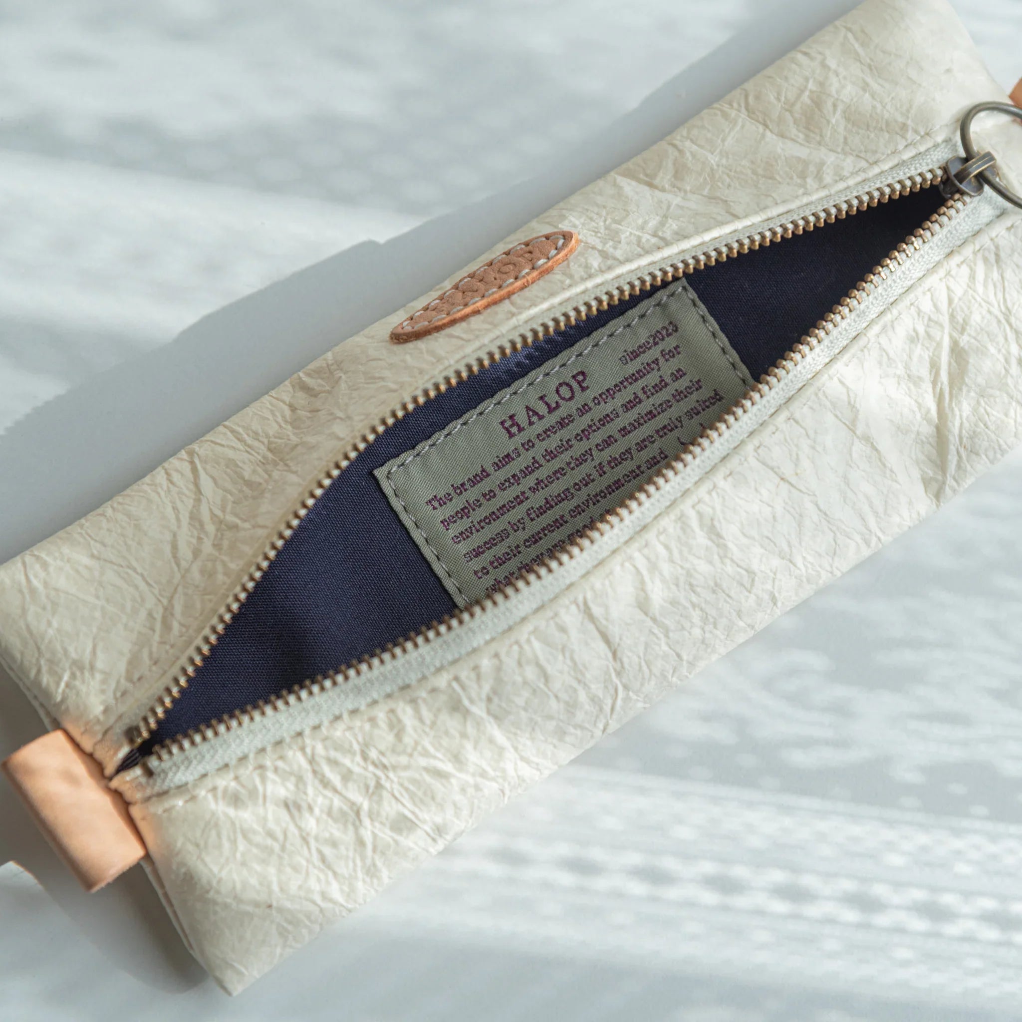 Handcrafted Sugihara Washi Paper Pen Case white color assortment showing white washi case with contents