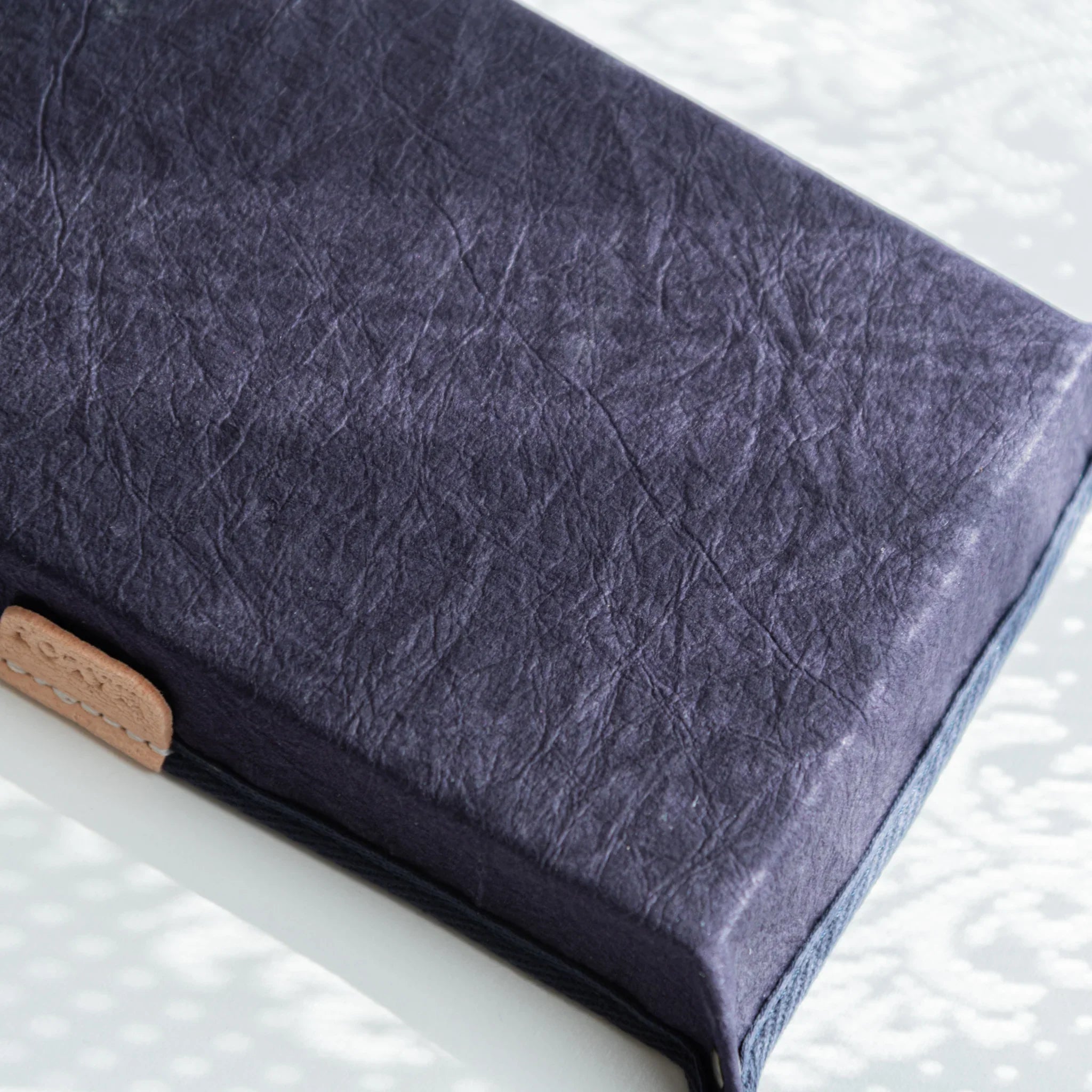 Macro shot of the purple Sugihara washi surface on Japanese Pen Tray, revealing natural fiber texture and depth.