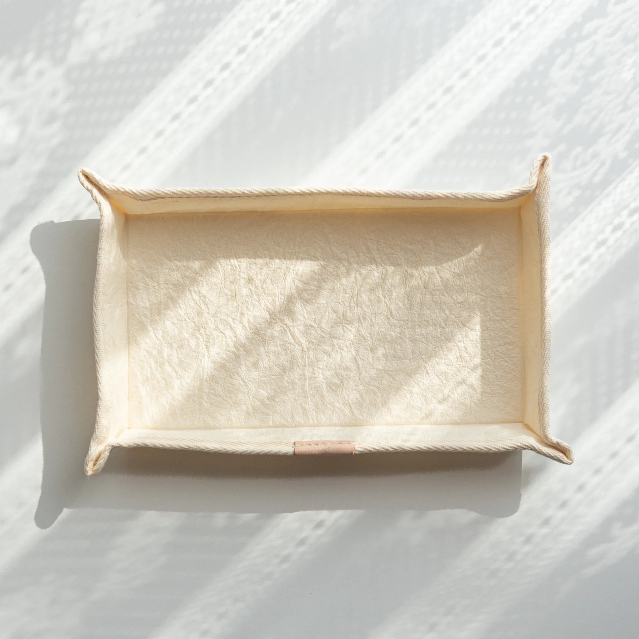 Handcrafted Sugihara Washi Paper Japanese Pen Tray in white, showcasing textured washi surface under soft daylight.