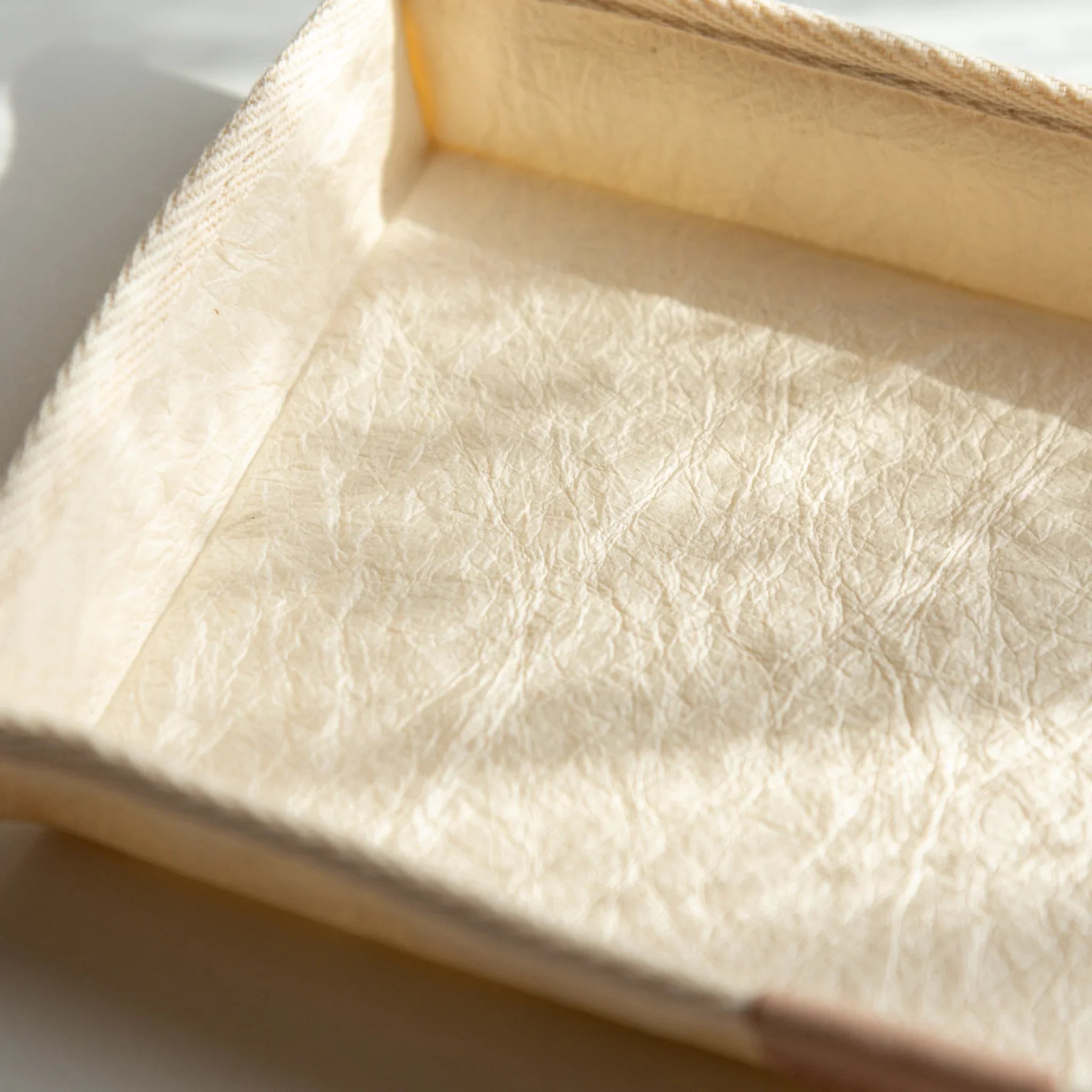 Close-up of the white Japanese Pen Tray showing the unique texture of Sugihara washi paper and soft handmade detail.