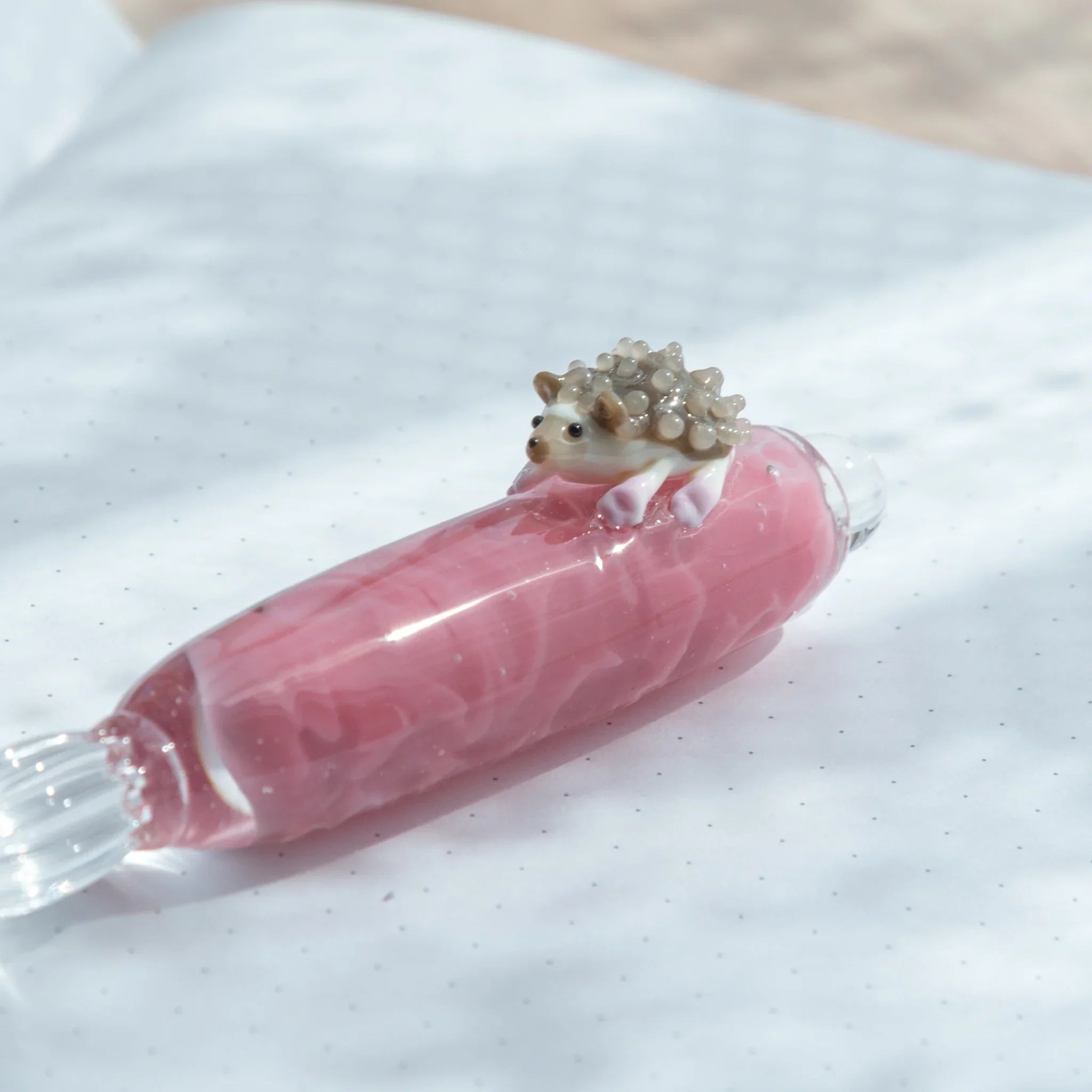 hand-made hedgehog glass dip pen with detailed resin work and decorative ceramic base holder with unique design