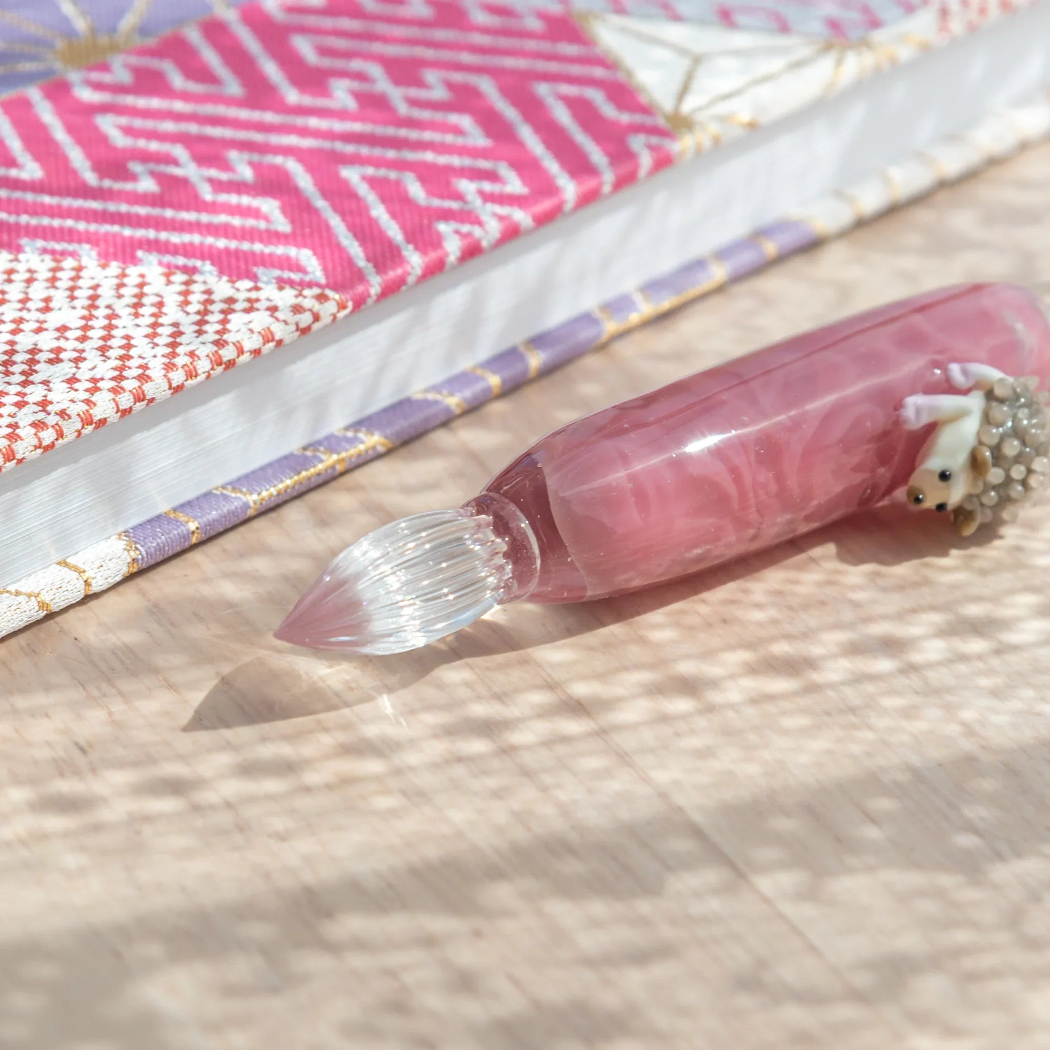 Glass dip pen featuring adorable hedgehog ideal for journaling with charming woodland character design