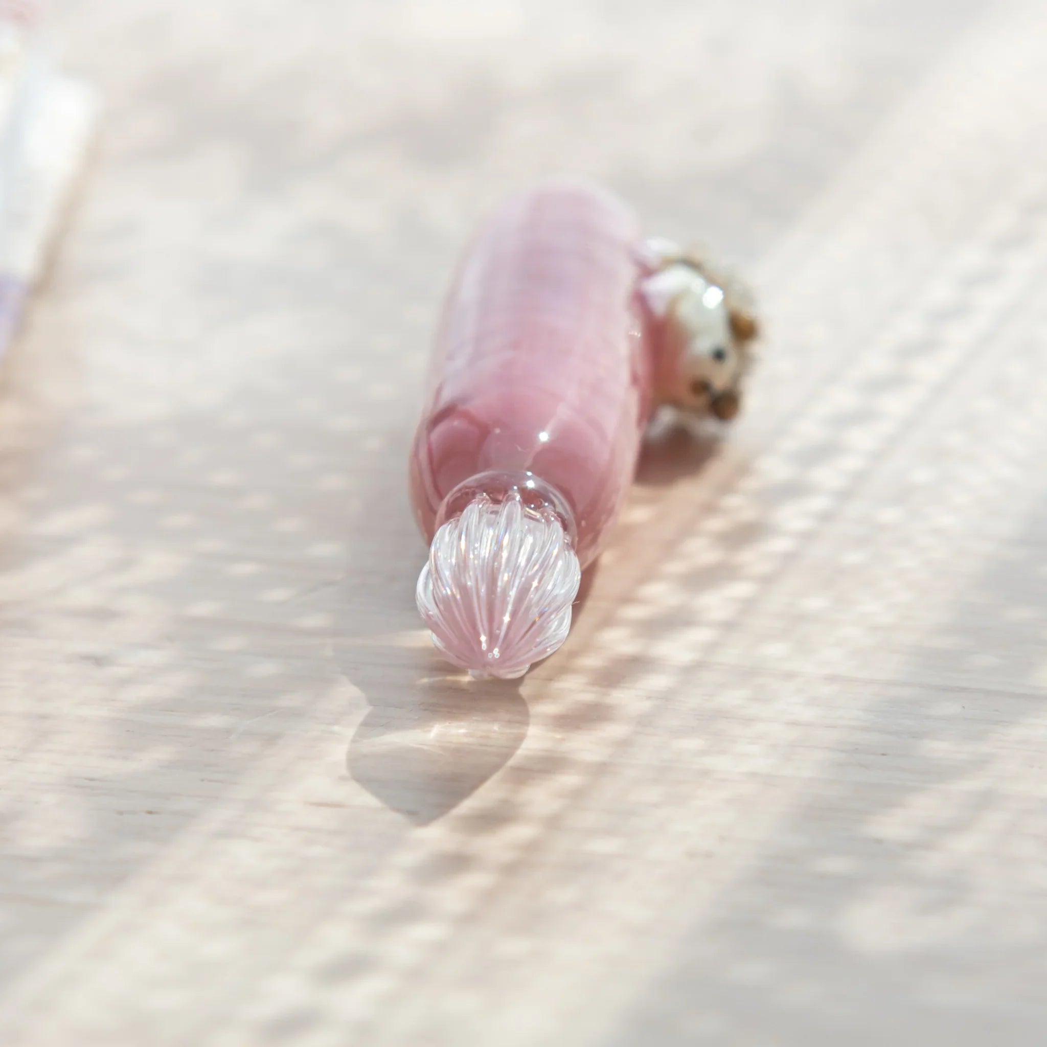 Hand-painted hedgehog glass dip pen bringing playful creature to decorative writing instruments with unique design