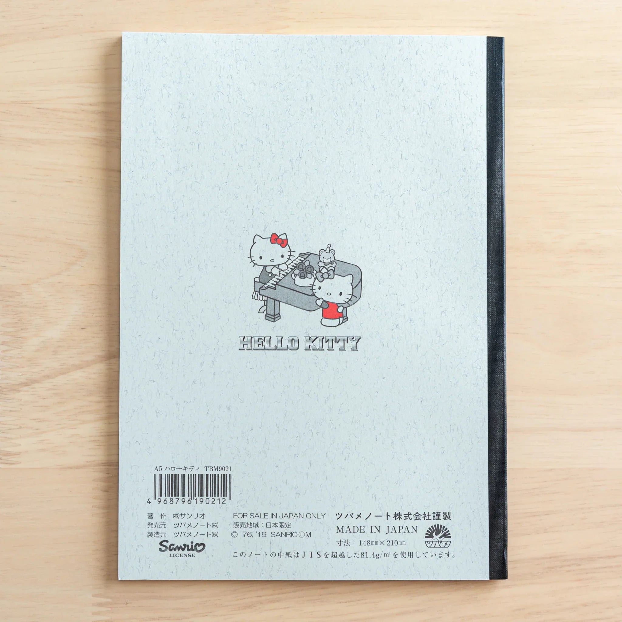 Hello Kitty character profile page inside Tsubame notebook featuring Japanese biographical text information detail