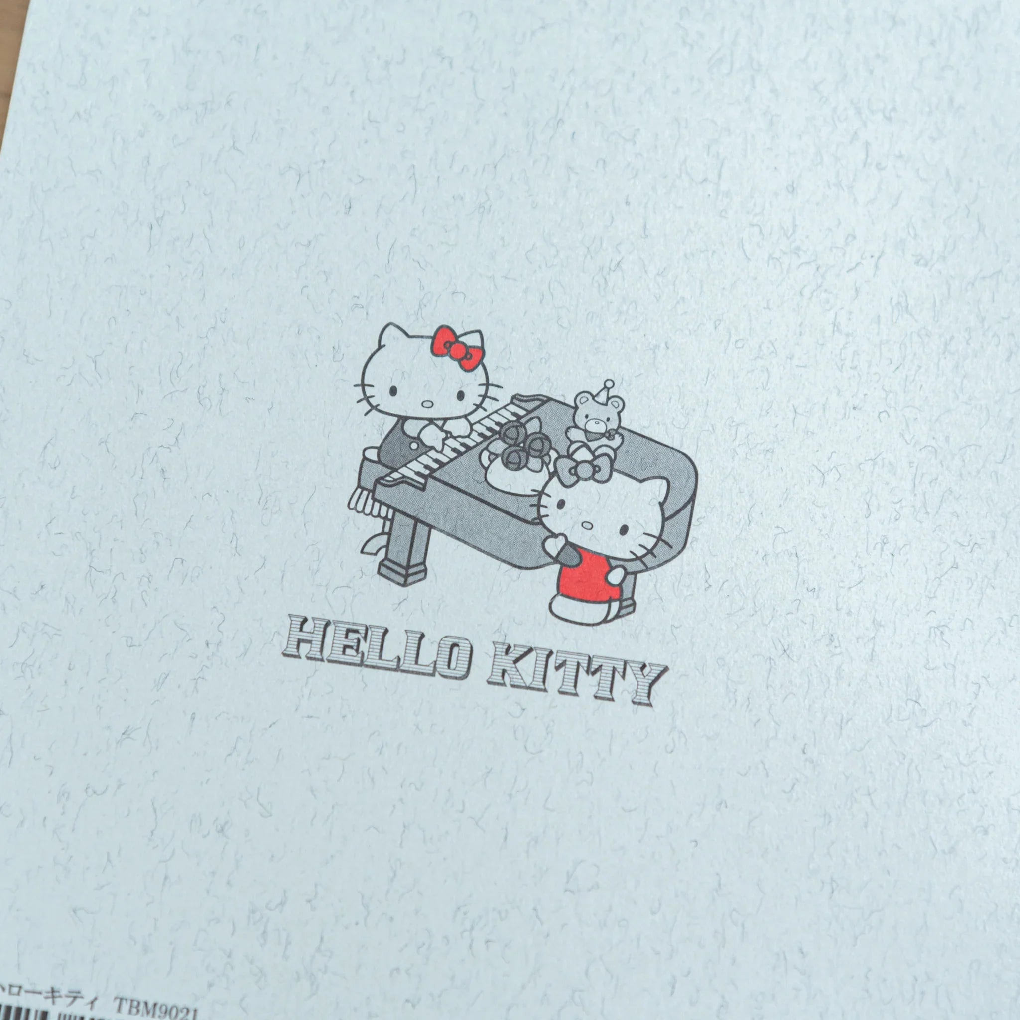 Hello Kitty Tsubame notebook back cover displaying barcode and product information details on white background surface