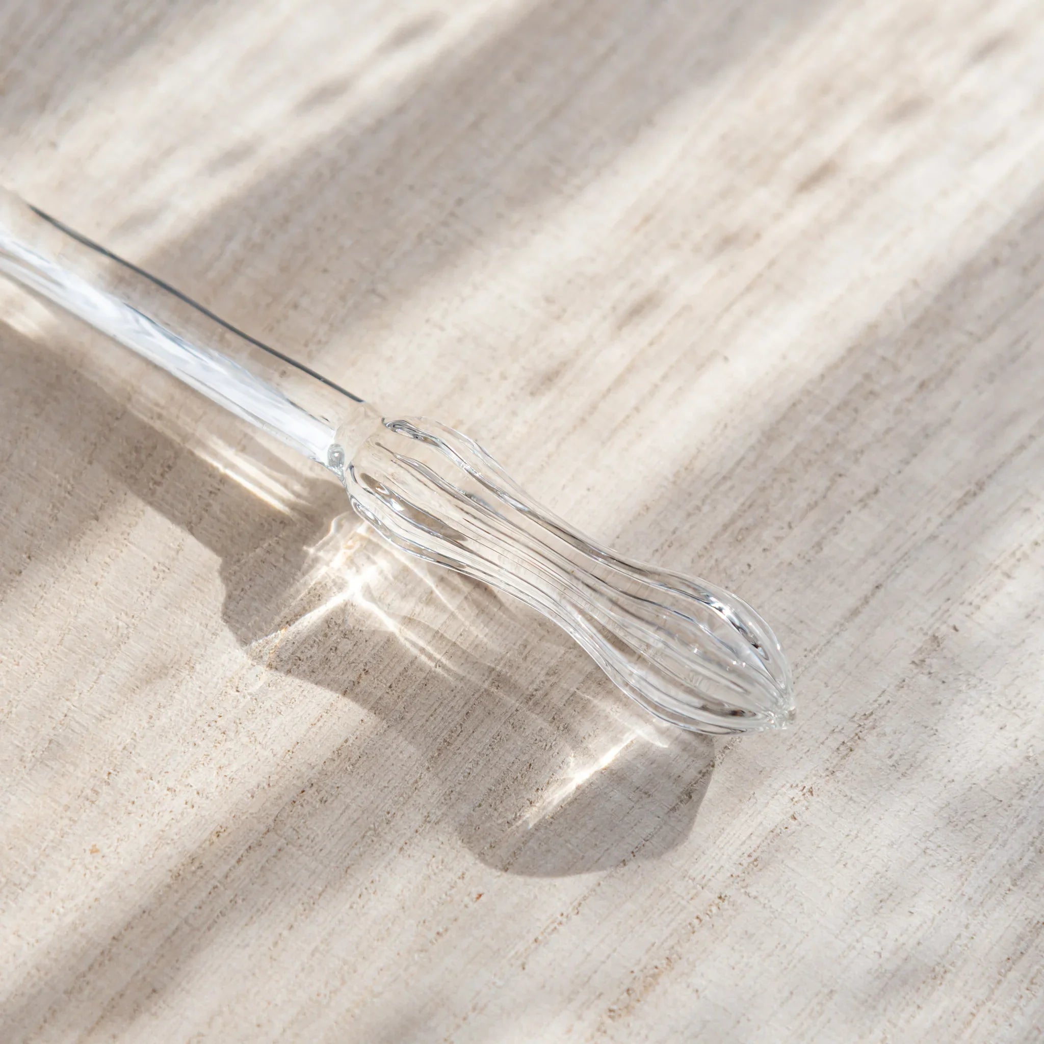 Hikari glass letter opener with clear glass shown in composition detail in composition view product composition view